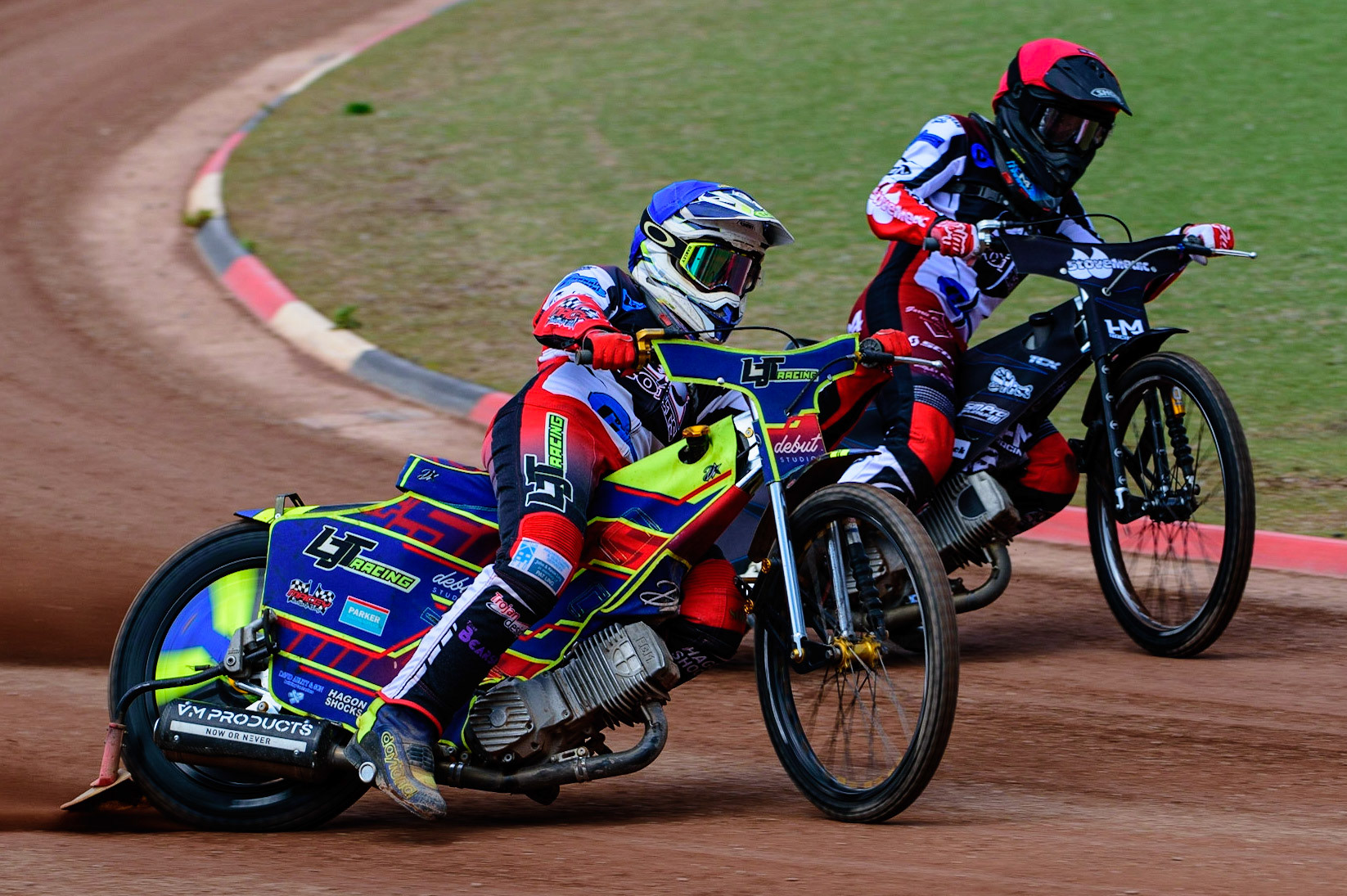 MANCHESTER, UK.  JUN 3RD Nathan Ablitt  (Blue) outside team mate Harry McGurk  (Red) as the Colts go for maximum heat points during the National Development League match between Belle Vue Colts and Oxford Chargers at the National Speedway Stadium, Manchester on Friday 3rd June 2022. (Credit: Ian Charles | MI News)