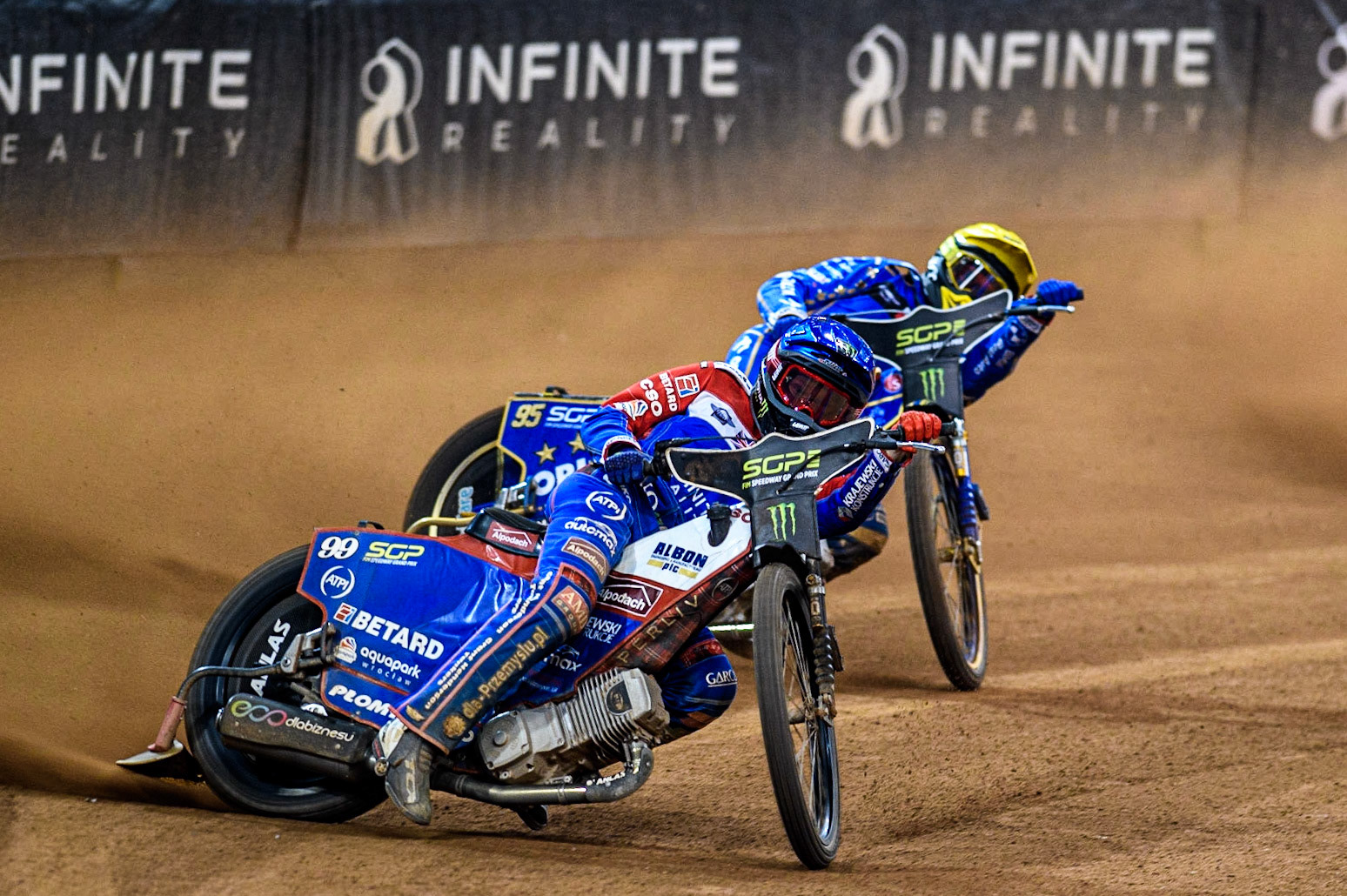 Dan Bewley (99) (Blue) leads  Bartosz Zmarzlik (95) (Yellow) during the FIM Speedway Grand Prix of Great Britain at the Principality Stadium, Cardiff on Saturday 2nd September 2023. (Photo: Ian Charles | MI News)