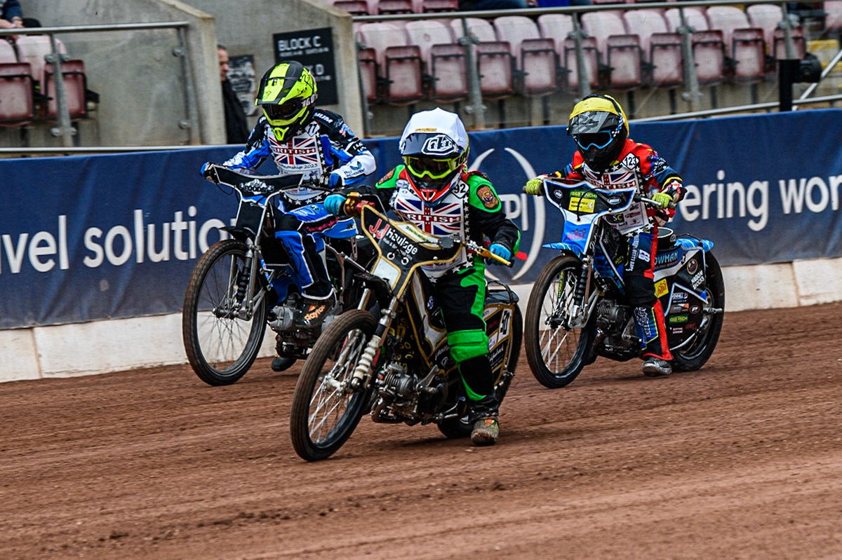 Archie Whitelam  (White) leads Charlie Fletcher (Yellow) and Jack Scully-Syer (Black\White) during the British Youth Championships at the National Speedway Stadium, Manchester on Friday 12th May 2023. (Photo: Ian Charles | MI News)