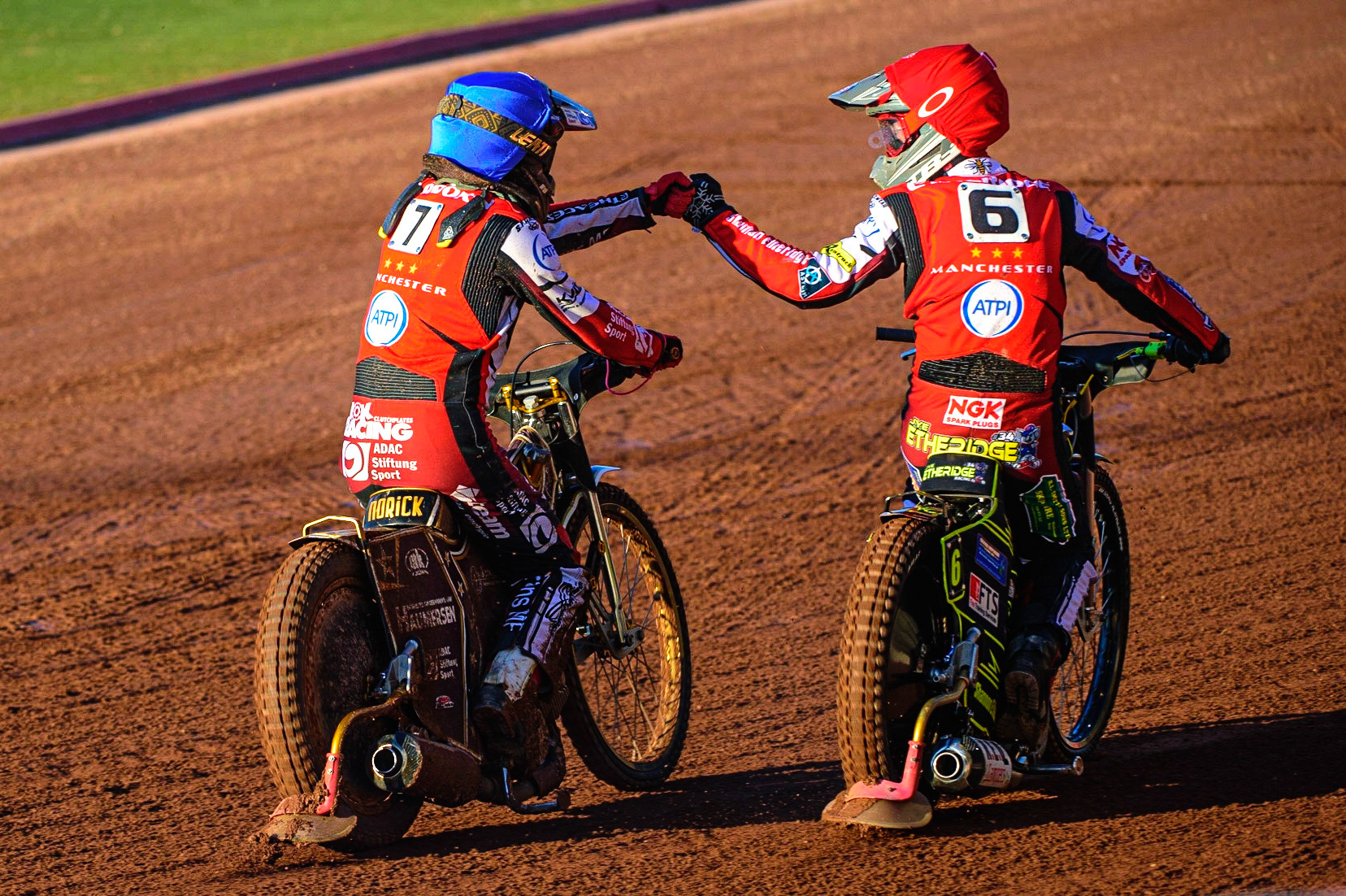 Jye Etheridge  (Red) and Norick Blodorn  (Blue) celebrate their maximum heat win after Blödorn came second from a 15 meter handicap at the start during the SGB Premiership match between Belle Vue Aces and Ipswich Witches at the National Speedway Stadium, Manchester on Monday 8th August 2022. (Credit: Ian Charles | MI News)