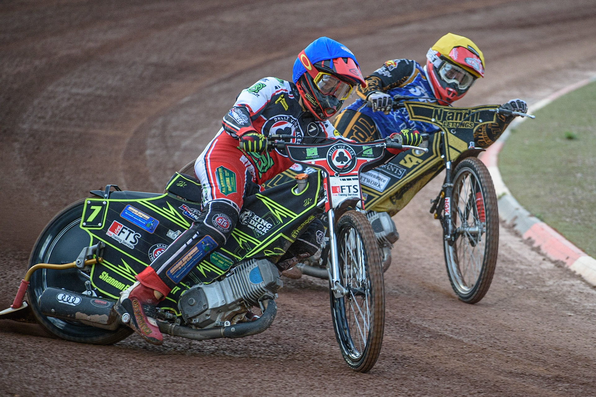 MANCHESTER, UK. AUGUST 23RD    Jye Etheridge  (Blue) leads Ben Barker  (Yellow) during the SGB Premiership match between Belle Vue Aces and King's Lynn Stars at the National Speedway Stadium, Manchester on Monday 23rd August 2021. (Credit: Ian Charles | MI News)