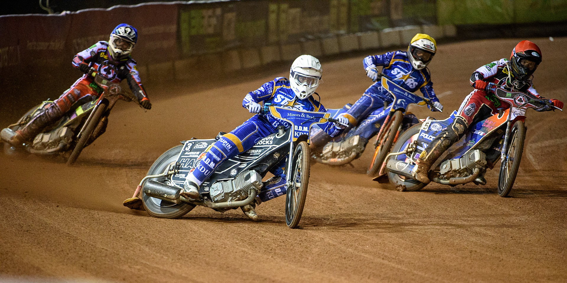 MANCHESTER, UK. SEPT 13TH  Erik Riss  (White) outside Brady Kurtz  (Red) with Lewis Kerr  (Yellow) and Tom Brennan  (Blue) behind during the SGB Premiership match between Belle Vue Aces and King's Lynn Stars at the National Speedway Stadium, Manchester on Monday 13th September 2021. (Credit: Ian Charles | MI News)