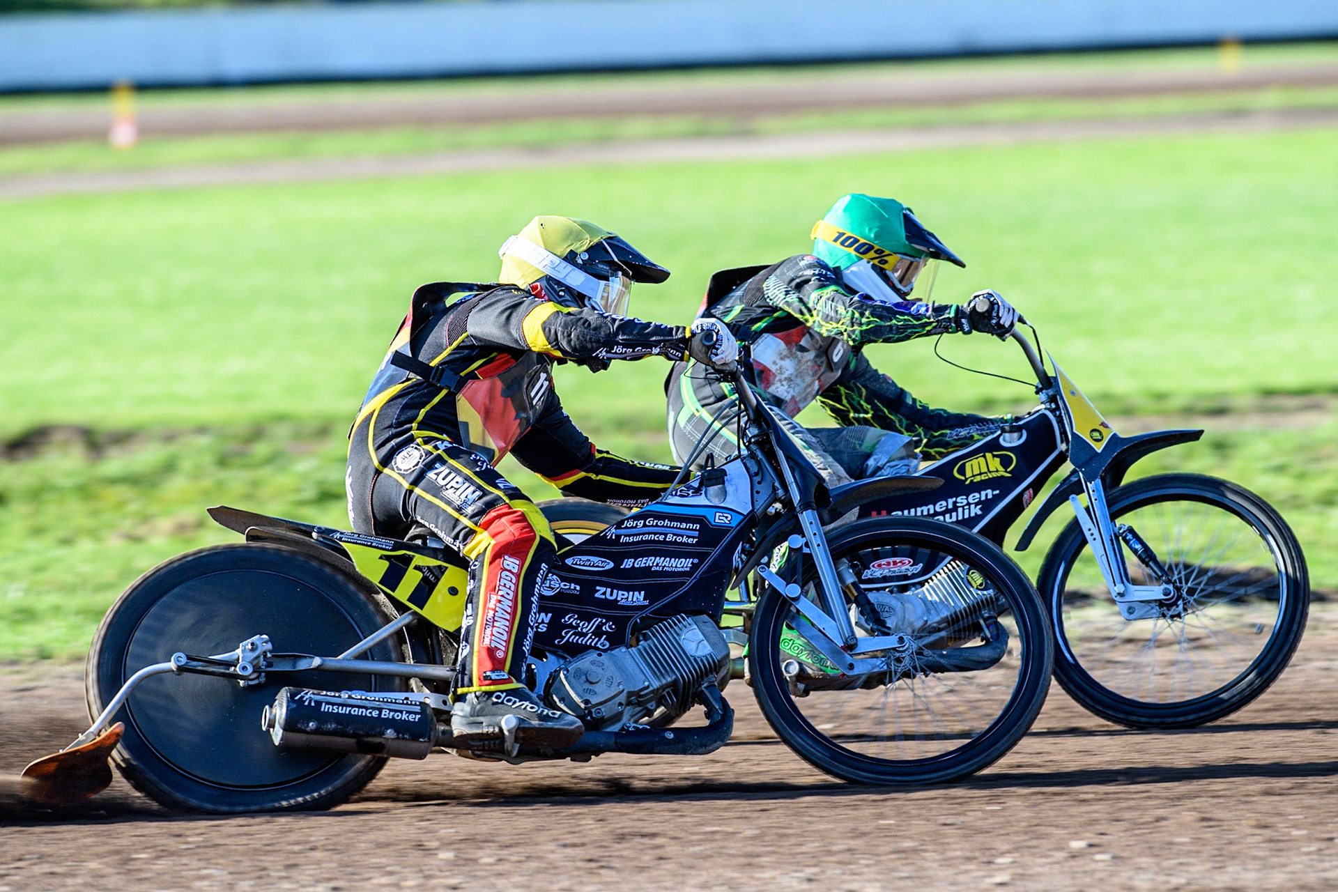 Erik Riss (Yellow) outside Tobias Thomsen (Green) during the FIM Long Track Of Nations event at the Speed Centre Roden on Sunday 24th September 2023. (Photo: Ian Charles | MI News)