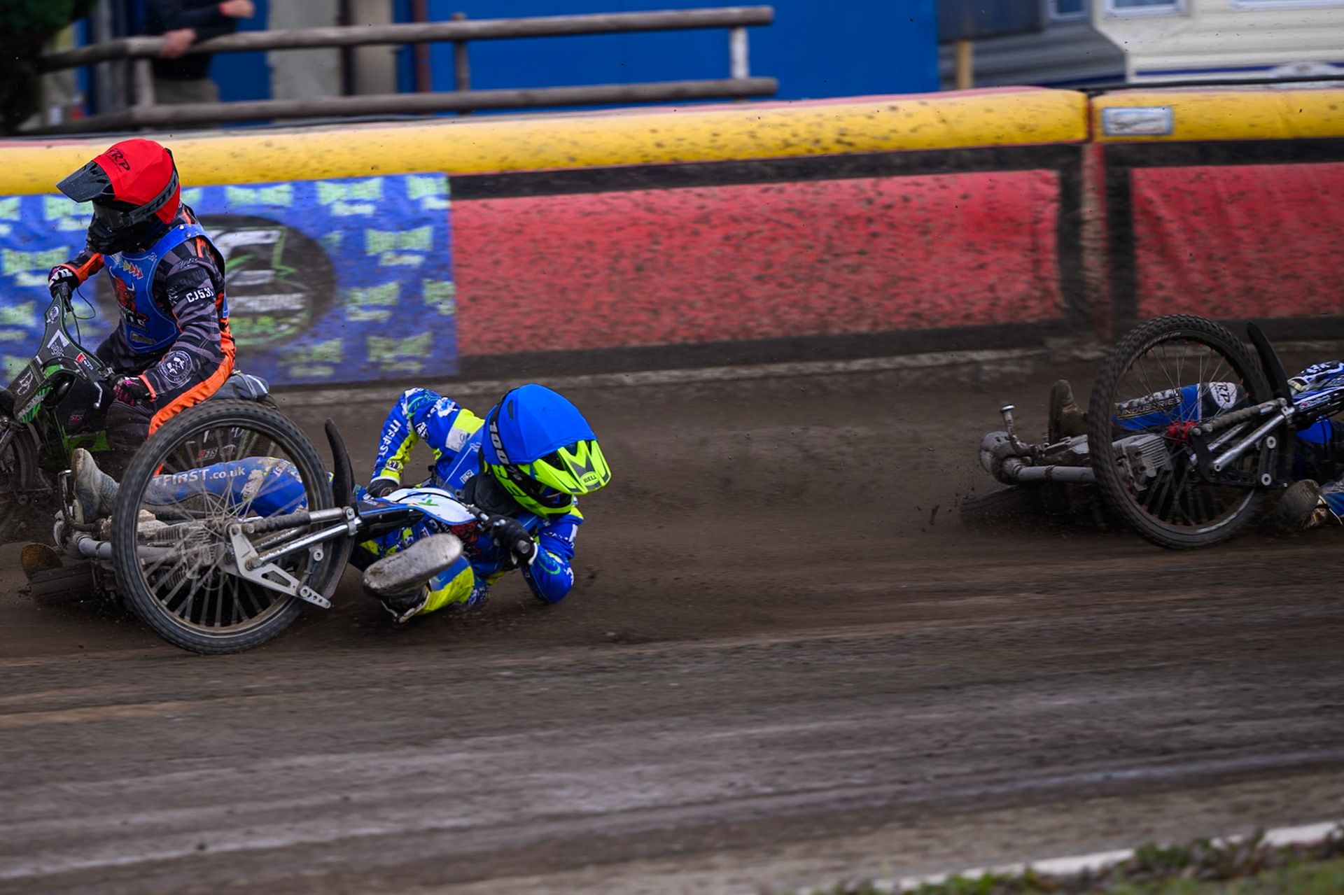 Will Boraston of Buxton Bulls in Yellow falls in the path of Ollie Binns of Kings Lynn Young Stars during the WSRA National Development League match between Buxton Bulls and King's Lynn Young Stars at Hi-Edge Speedway, Buxton on Sunday 9th August 2026. (Photo: Ian Charles | MI News)