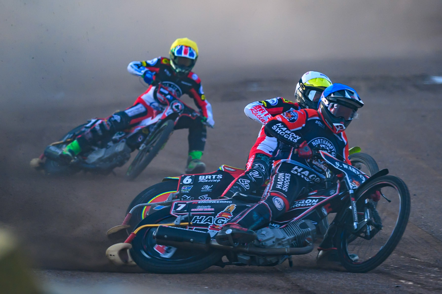 Sam Hagon, Guest Rider for Northampton Foxes in Blue leading Tate Zischke of Belle Vue Aces  in White  and Will Cairns of Belle Vue Aces in Yellow during the Rowe Motor Oil Premiership match between Northampton Foxes and Belle Vue Aces at Northampton International Shaleway, Northampton on Thursday 13th August 2026. (Photo: Ian Charles | MI News)
