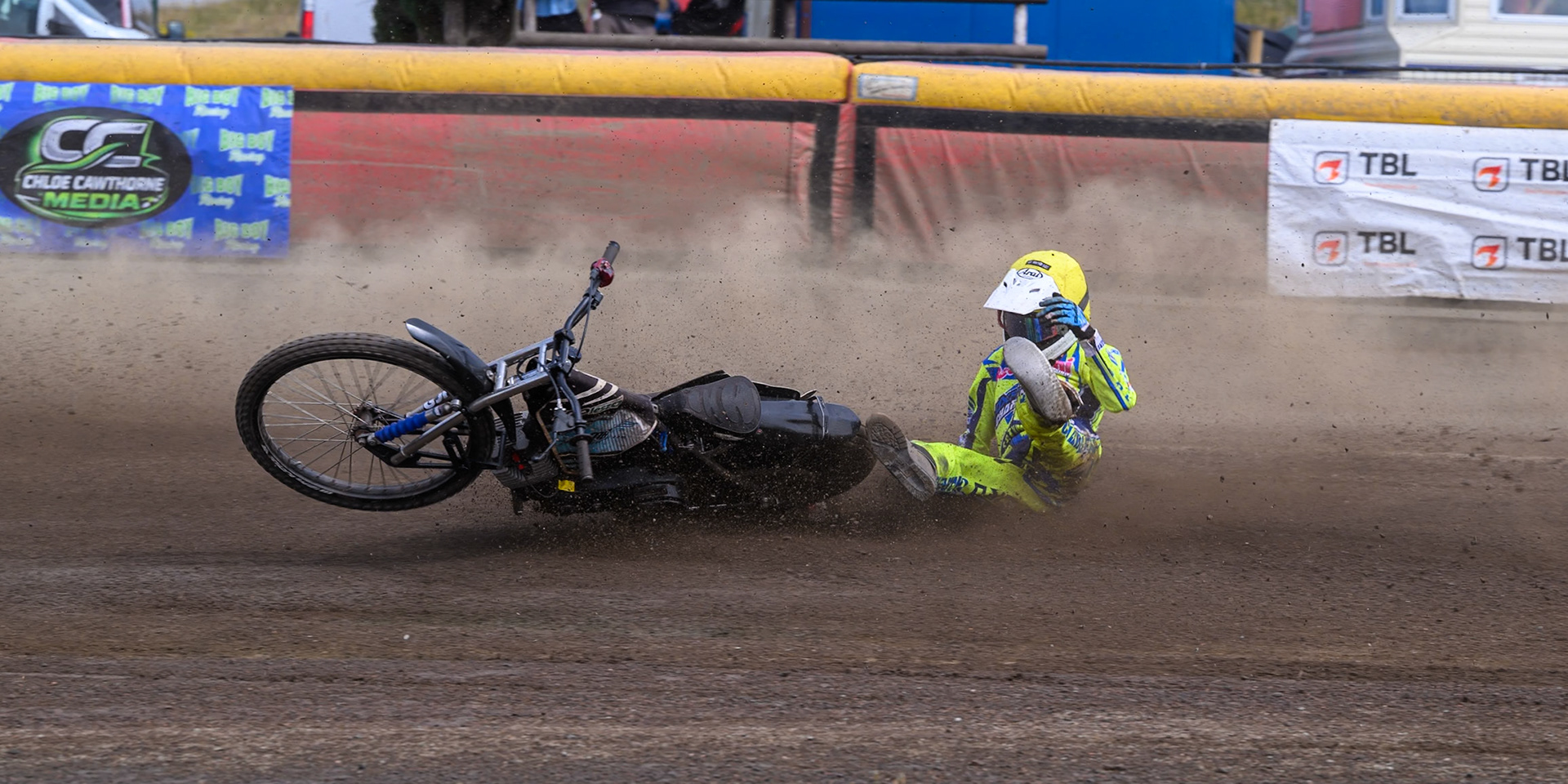 Harry Fletcher of Oxford Chargers in Yellow  falls during the WSRA National Development League match between Buxton Bulls and Oxford Chargers at Hi-Edge Speedway, Buxton on Sunday 2nd August 2026. (Photo: Ian Charles | MI News)
