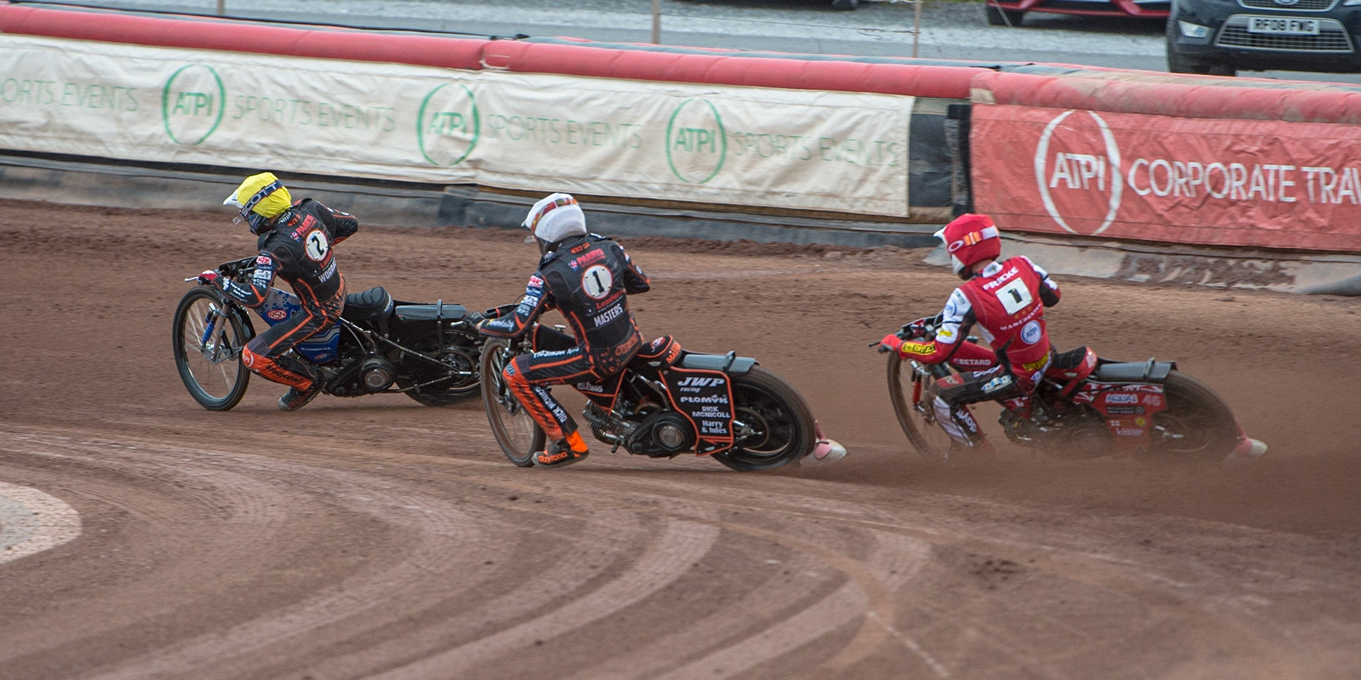 MANCHESTER, UK. JUN 13TH Max Fricke  (Red) chases Sam Masters  (White) and Steve Worrall  (Yellow) during the SGB Premiership match between Belle Vue Aces and Wolverhampton  Wolves at the National Speedway Stadium, Manchester on Monday 13th June 2022. (Credit: Ian Charles | MI News)
