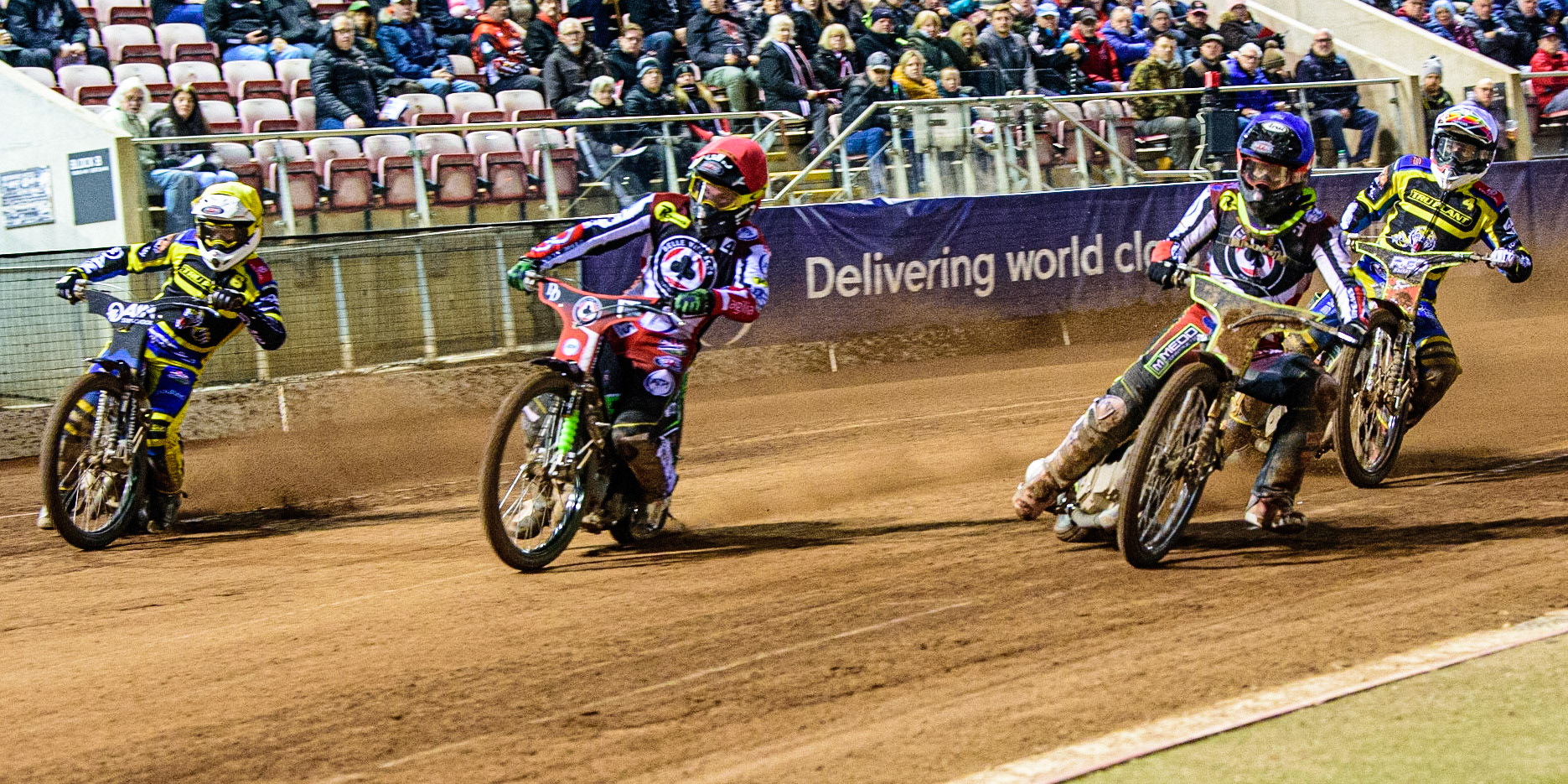 Tom Brennan  (Blue) and Charles Wright  (Red) lead David Bellego  (White) and Lewis Kerr  (Yellow) during the SGB Premiership match between Belle Vue Aces and Sheffield Tigers at the National Speedway Stadium, Manchester on Monday 27th March 2023. (Photo: Ian Charles | MI News)