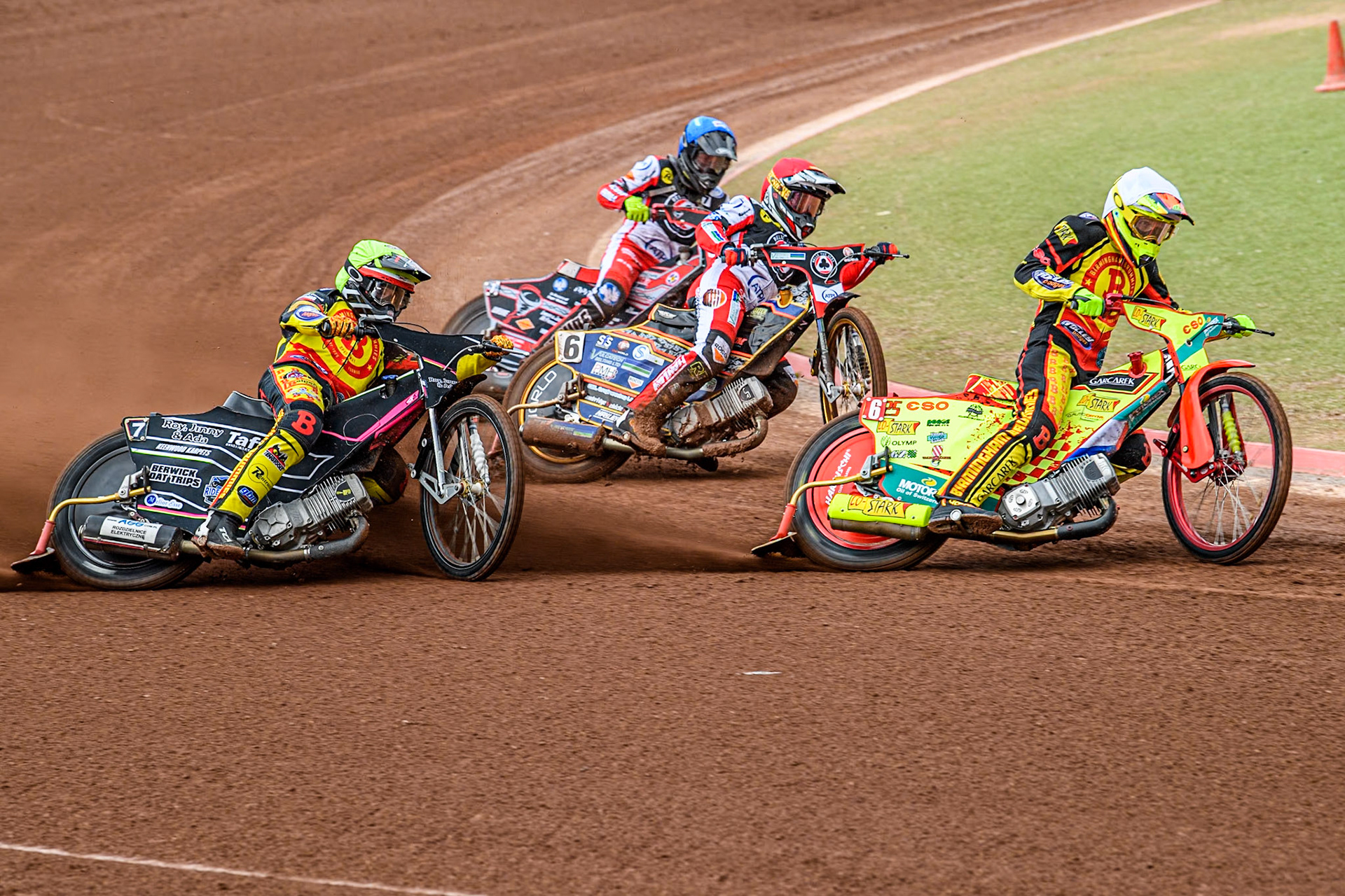 Birmingham Brummies' Vaclav Milik  in White leading Birmingham Brummies' Leon Flint  in Yellow, Belle Vue Aces' Connor Mountain  in Red and Belle Vue Aces' Connor Bailey  in Blue during the Rowe Motor Oil Premiership match between Belle Vue Aces and Birmingham Brummies at the National Speedway Stadium, Manchester on Monday 6th May 2024. (Photo: Ian Charles | MI News)