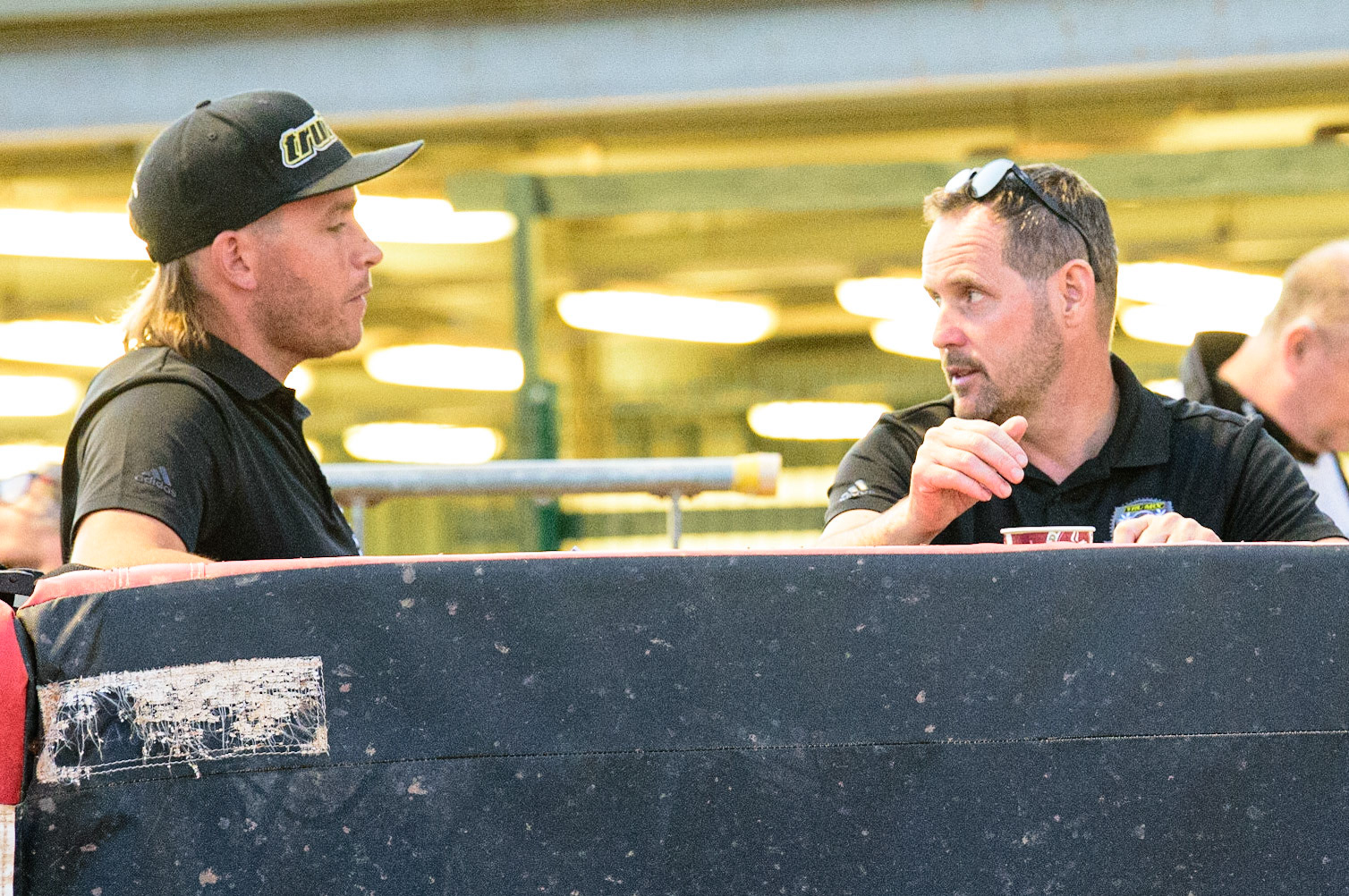 Ipswich TruMix Witches  team manager Ritchie Hawkins  (left) chats with Ipswich promoter Chris Louis during the SGB Premiership match between Belle Vue Aces and Ipswich Witches at the National Speedway Stadium, Manchester on Monday 8th August 2022. (Credit: Ian Charles | MI News)