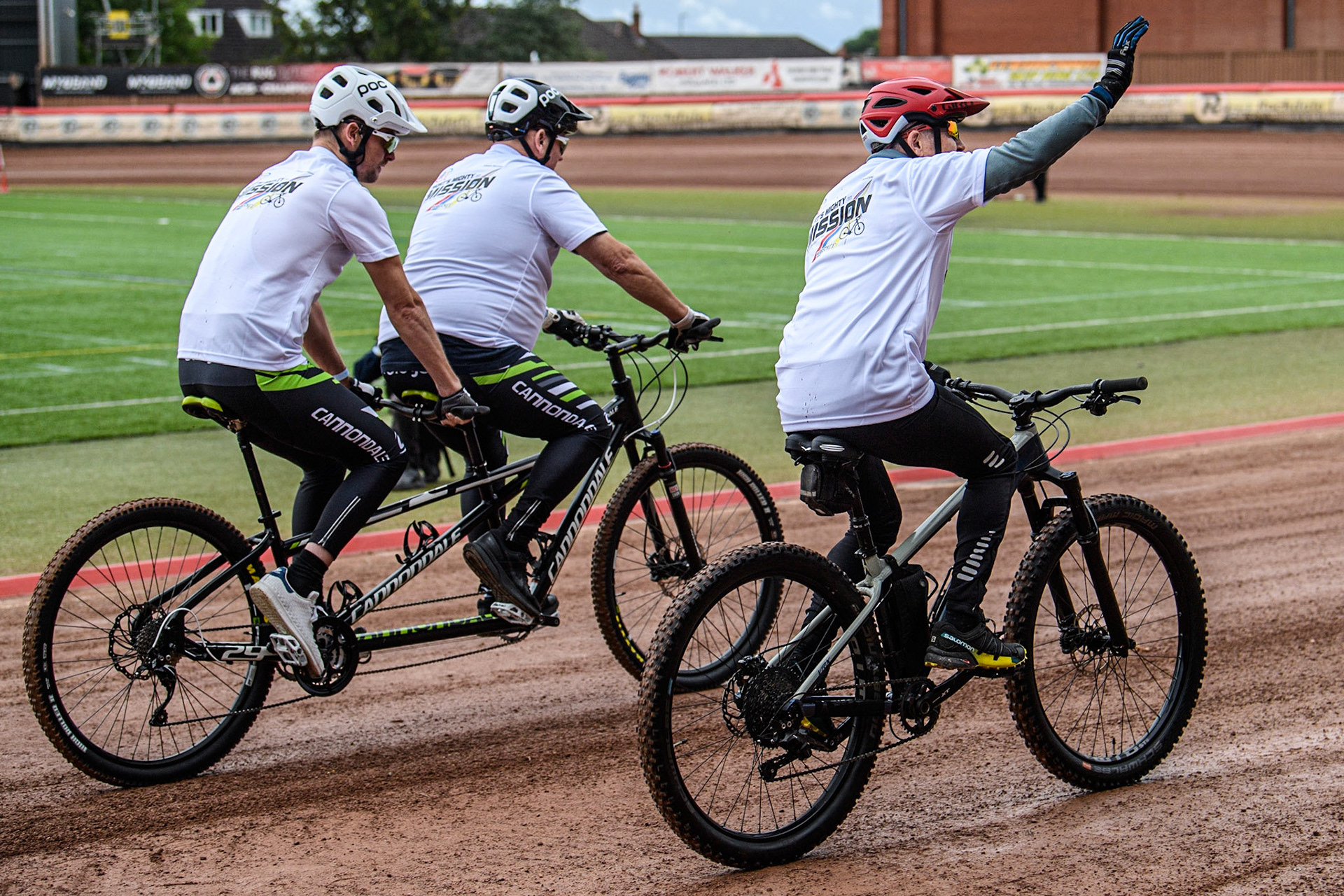 Former Belle Vue Rider Chris Morton (nearest Camera) together with former rider Ricky Ashworth and his tandem pilot, Dad Dave, start ‘Mort’s Mighty Mission’, to ride to the Principality Stadium Cardiff, in aid of the Speedway Riders Benevolent Fund during the Sports Insure Premiership match between Belle Vue Aces and Leicester Lions at the National Speedway Stadium, Manchester on Monday 28th August 2023. (Photo: Ian Charles | MI News)