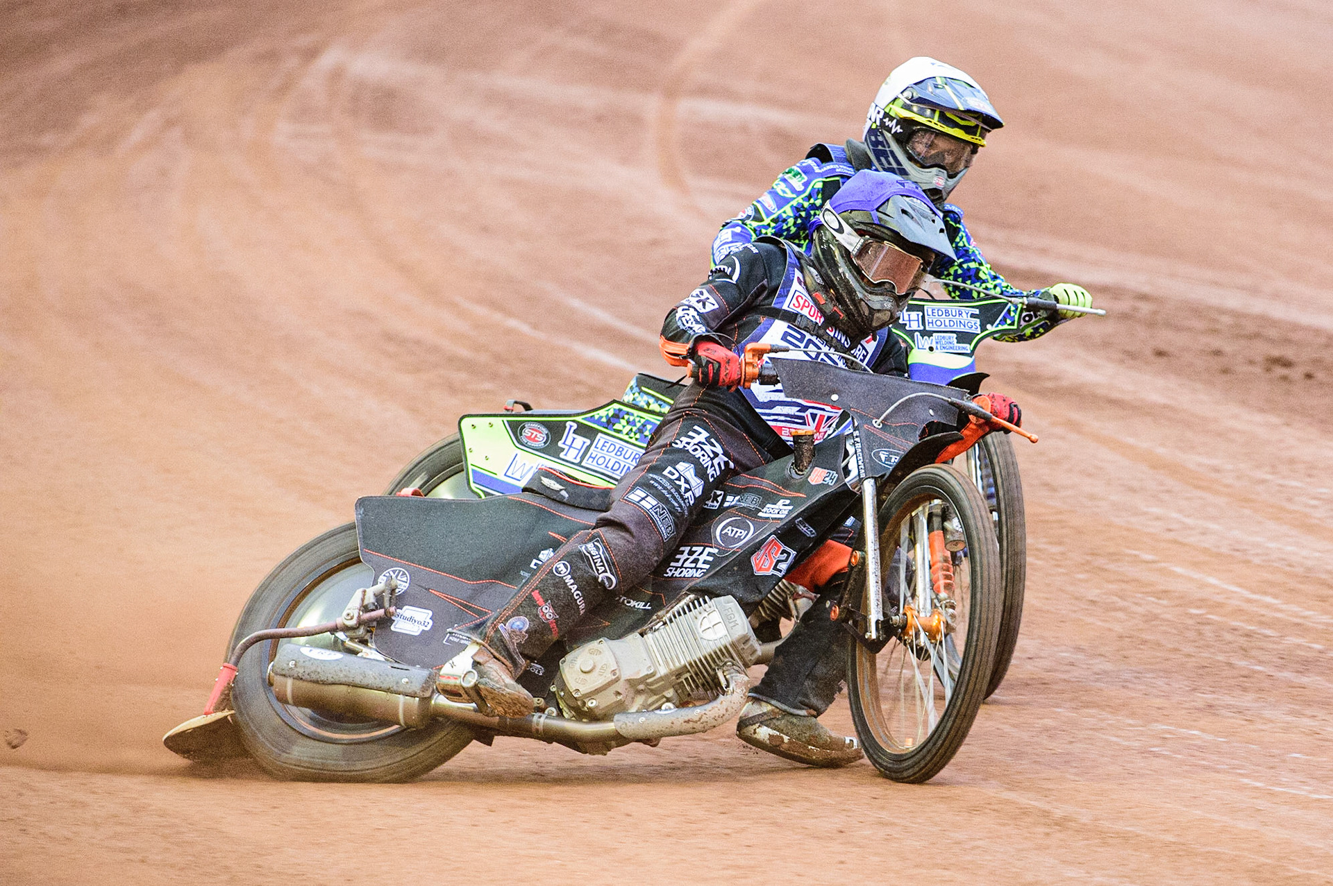 Meeting reserve Jack Smith (Blue) passes Paul Starke  (White) during the Sports Insure British Speedway Championship Final at the National Speedway Stadium, Bellevue, Manchester, England on Monday 1st August 2022. (Photo by: Ian Charles | MI News)