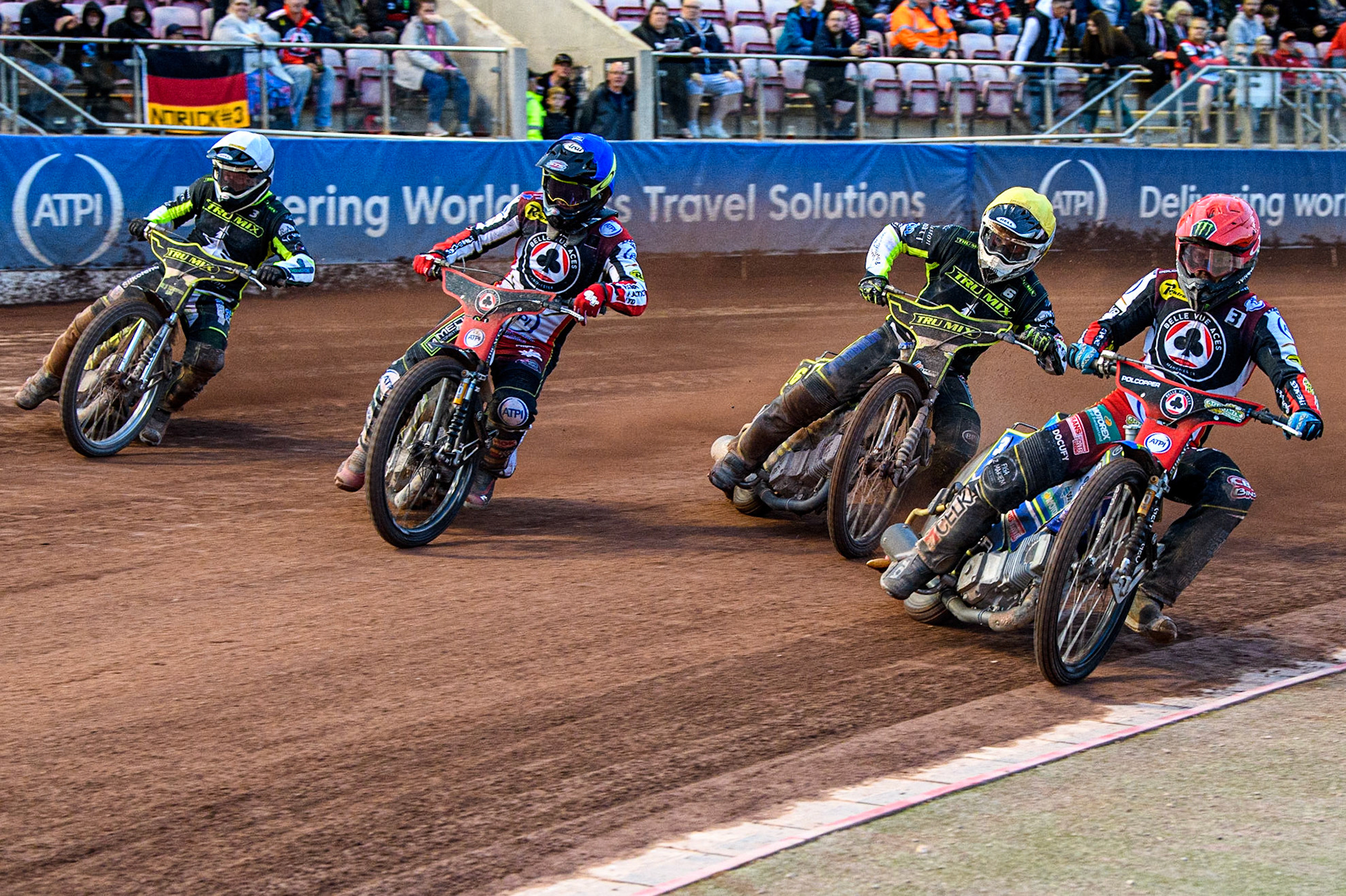 Jaimon Lidsey (Red) and Tom Brennan (Blue) lead Danny King (White) and Danyon Hume (Yellow) during the Sports Insure Premiership match between Belle Vue Aces and Ipswich Witches at the National Speedway Stadium, Manchester on Monday 17th July 2023. (Photo: Ian Charles | MI News)