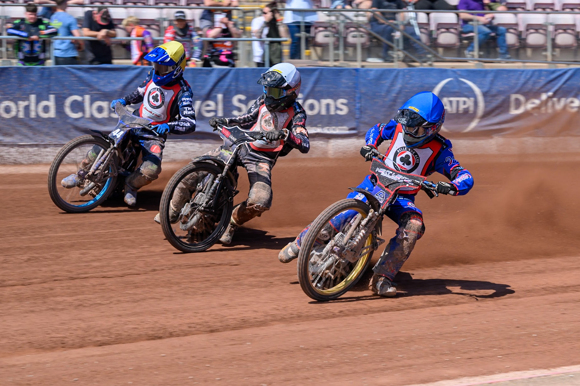 COLTS ACADEMY INDIVIDUAL EVENT Emerson Betty in Blue rides inside Seth Norman in White  and Charlie Southwick in Yellow during the JR Ashworth &amp; Sons Colts Academy Event at the National Speedway Stadium, Manchester on Sunday 19th July 2026. (Photo: Ian Charles | MI News)