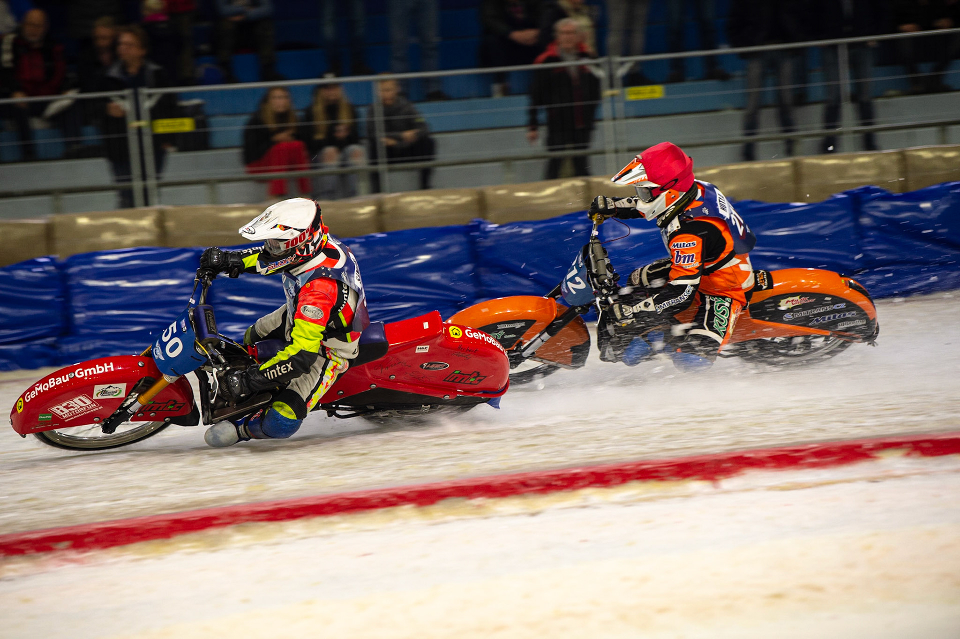HEERENVEEN, NL.Harald Simon (50) (White) passes Lukas Hutla (212) (Red)  during the FIM Ice Speedway Gladiators World Championship Final 3 at Ice Rink Thialf, Heerenveen on Saturday  2 April 2022. (Credit: Ian Charles | MI News)