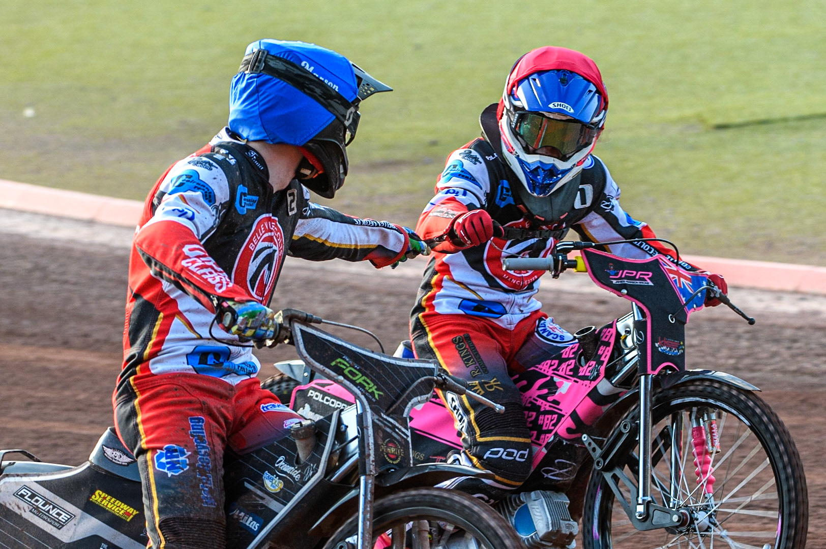 Matt Marson (Blue) and James Pearson (Red) celebrate their heat win during the National Development League match between Belle Vue Colts and Kent Royals at the National Speedway Stadium, Manchester on Friday 7th July 2023. (Photo: Ian Charles | MI News)