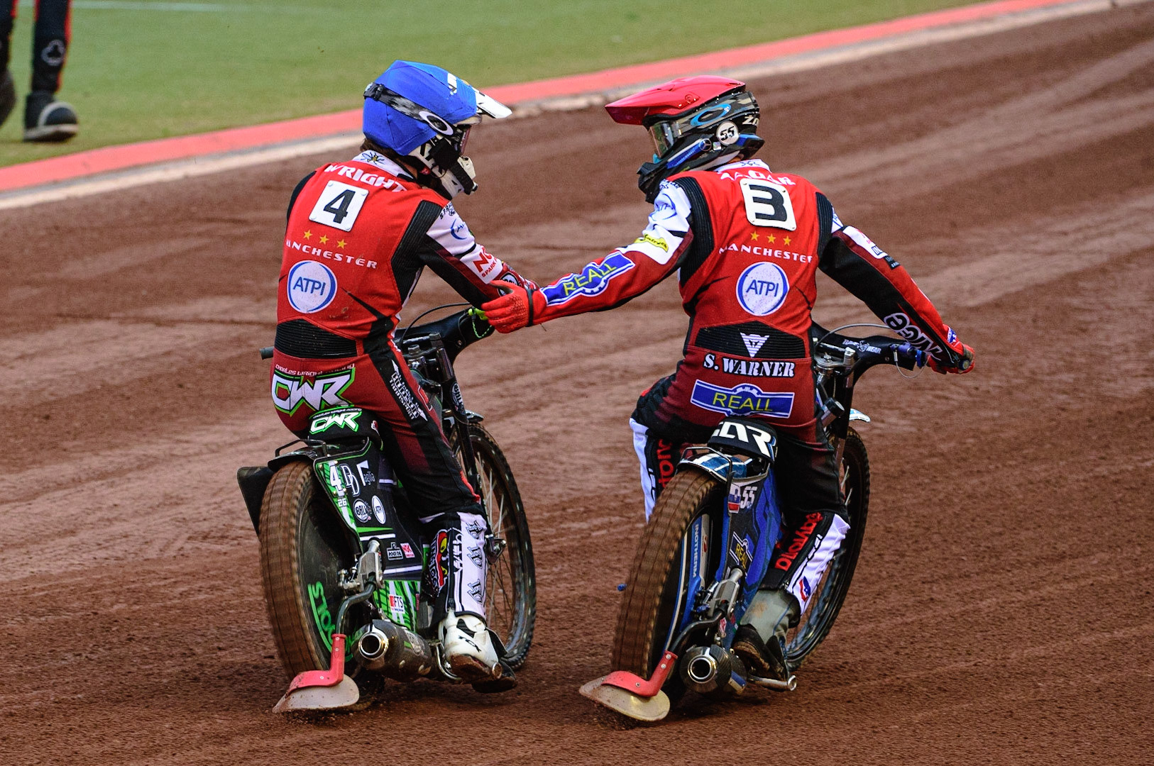 MANCHESTER, UK. JUN 6TH Charles Wright  (Blue) and Matej Žagar  (Red) celebrate their heat win  during the SGB Premiership match between Belle Vue Aces and Ipswich Witches at the National Speedway Stadium, Manchester on Monday 6th June 2022. (Credit: Ian Charles | MI News)