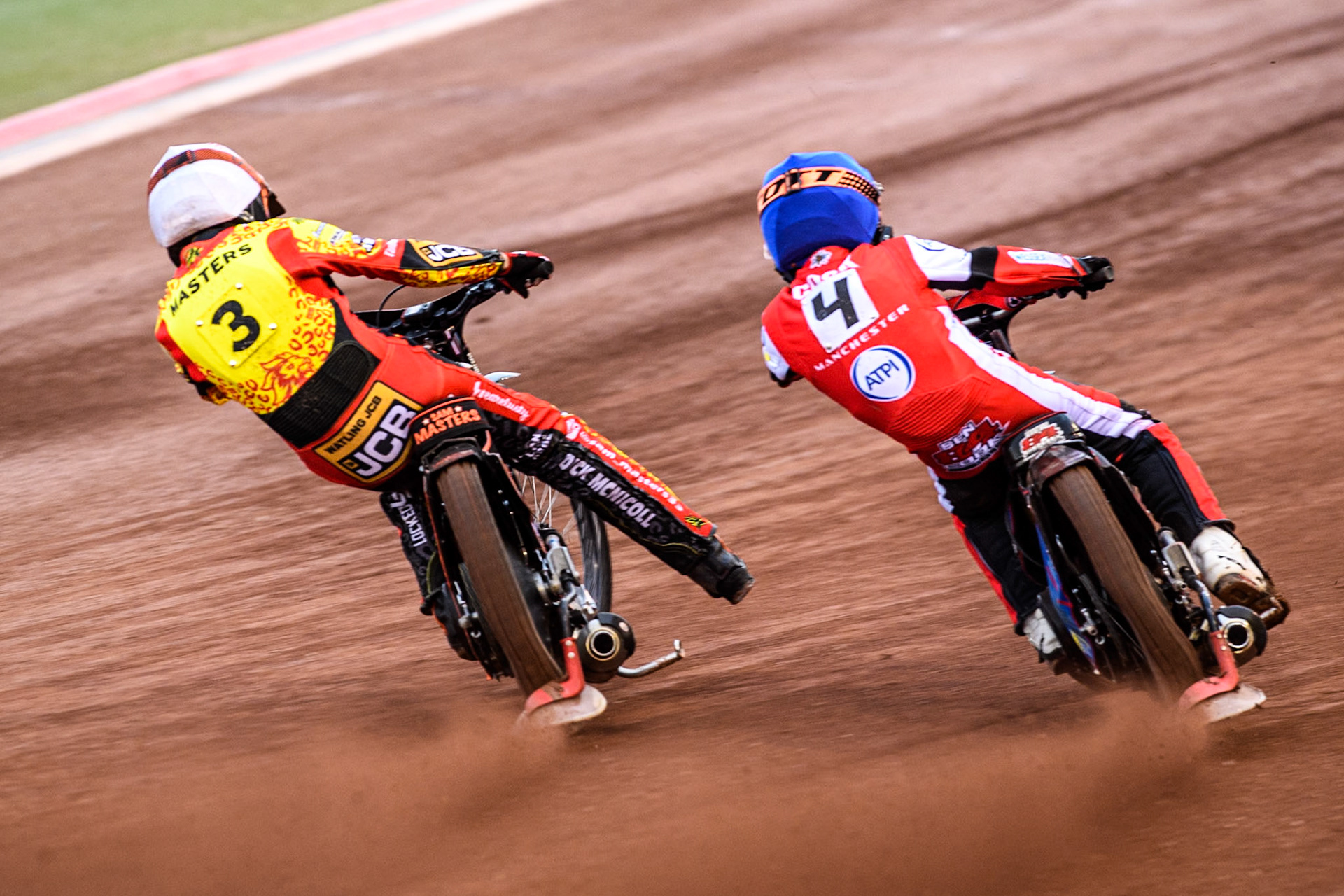 Belle Vue Aces' Ben Cook in Blue passes Leicester Lions' Sam Masters in White during the Rowe Motor Oil Premiership match between Belle Vue Aces and Leicester Lions at the National Speedway Stadium, Manchester on Monday 24th June 2024. (Photo: Ian Charles | MI News)