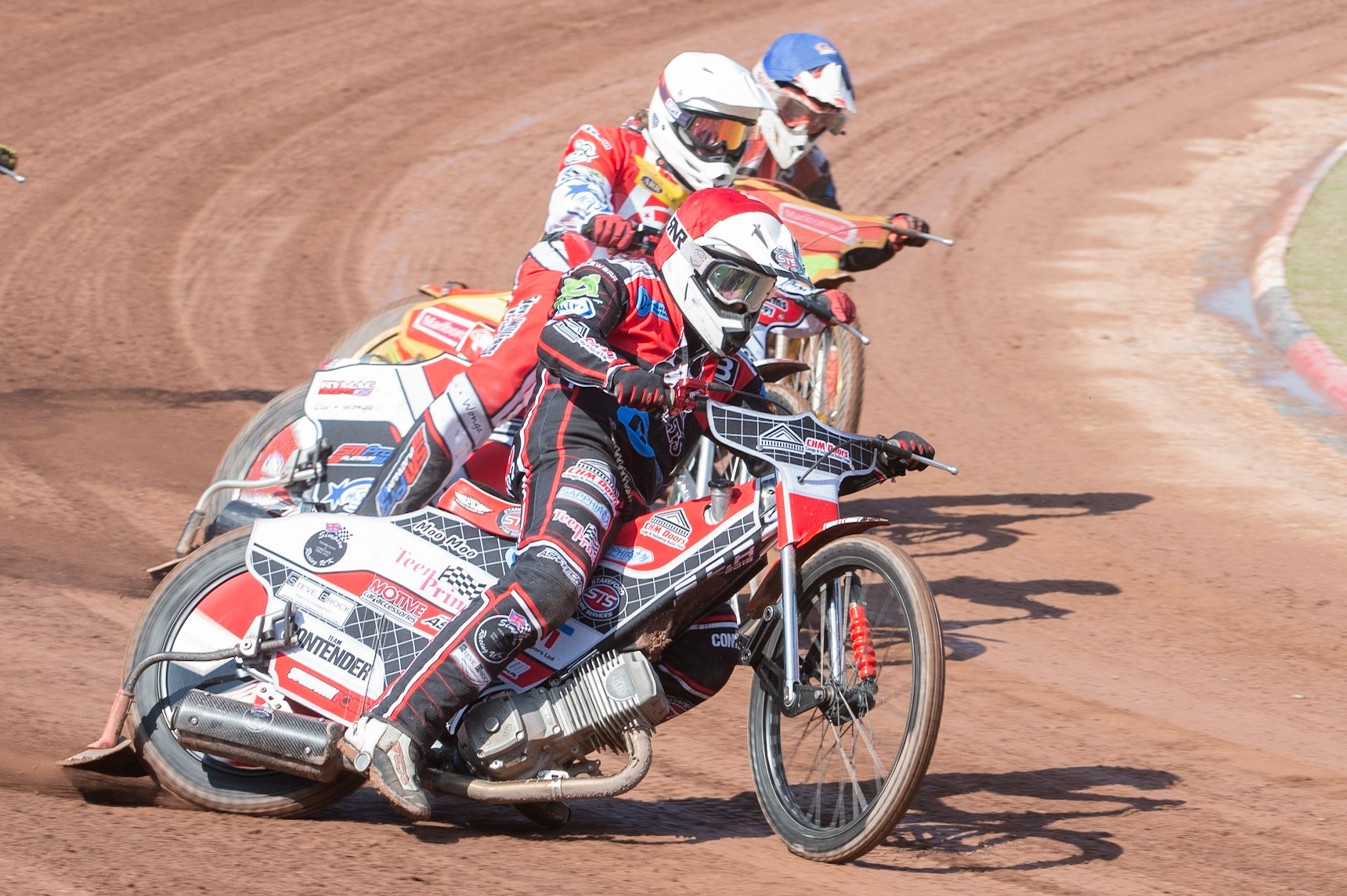 Photo: Ian Charles

Belle Vue Colts’ Danny Phillips (Red) and Ben Woodhull (Blue) on their way to maximum points against Stoke’s Luke Chessell (White) 

Belle Vue Colts v Stoke Potters, National League, Belle Vue National Speedway Stadium, Manchester, Friday 19  April  2019