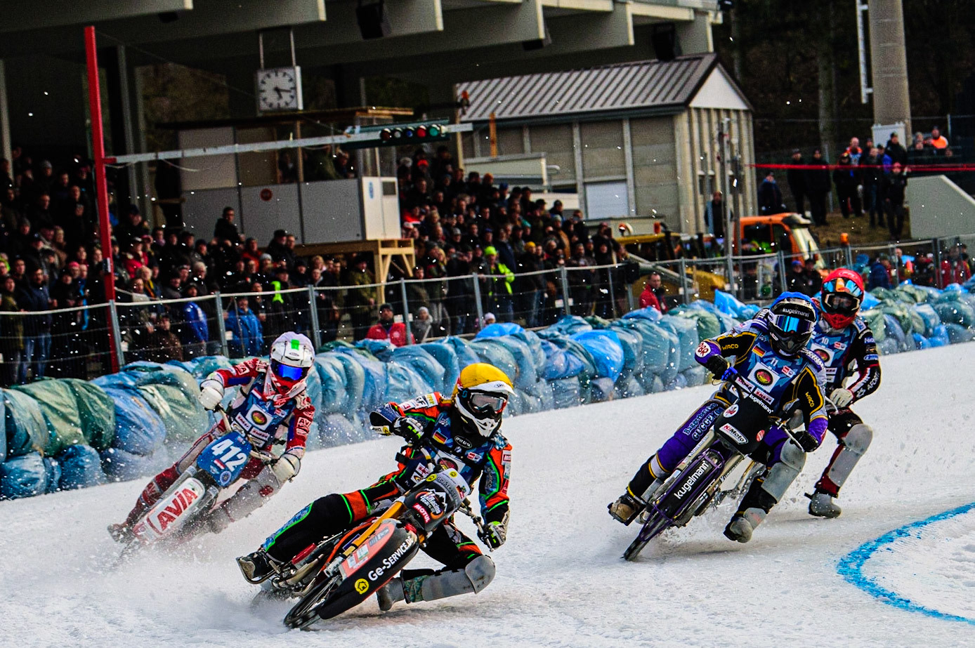 Markus Jell (Yellow) leads Niek Schaap (White) Christoph Kirchner (Blue) and Topi Mustonen (Red) during the German Individual Ice Speedway Championship at Horst-Dohm-Eisstadion, Berlin on Friday 3rd March 2023. (Photo: Ian Charles | MI News)