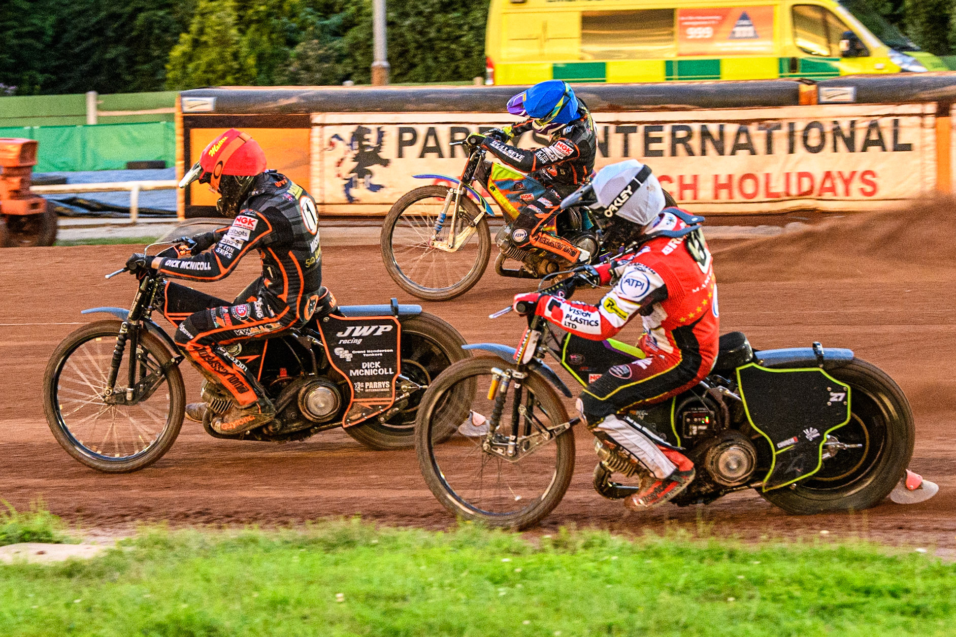Tom Brennan (White) inside Sam Masters (Red) and Rory Schlein (Blue) during the Sports Insure Premiership match between Wolverhampton Wolves and Belle Vue Aces at Monmore Green Stadium, Wolverhampton on Monday 10th July 2023. (Photo: Ian Charles | MI News)