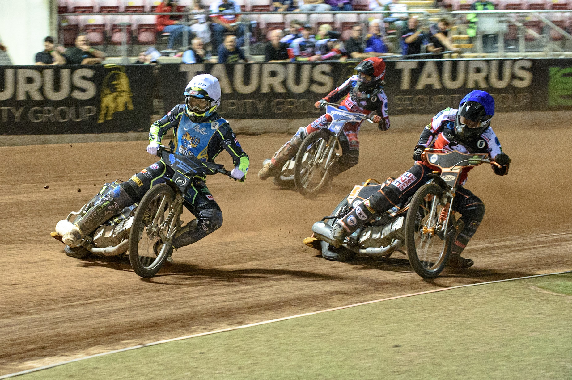 MANCHESTER, UK. AUGUST 20TH \kd1\ (White) leads Jack Smith  (Blue) and Harry McGurk  (Red) during the National Development League match between Belle Vue Aces and Armadale Devils at the National Speedway Stadium, Manchester on Friday 20th August 2021. (Credit: Ian Charles | MI News)