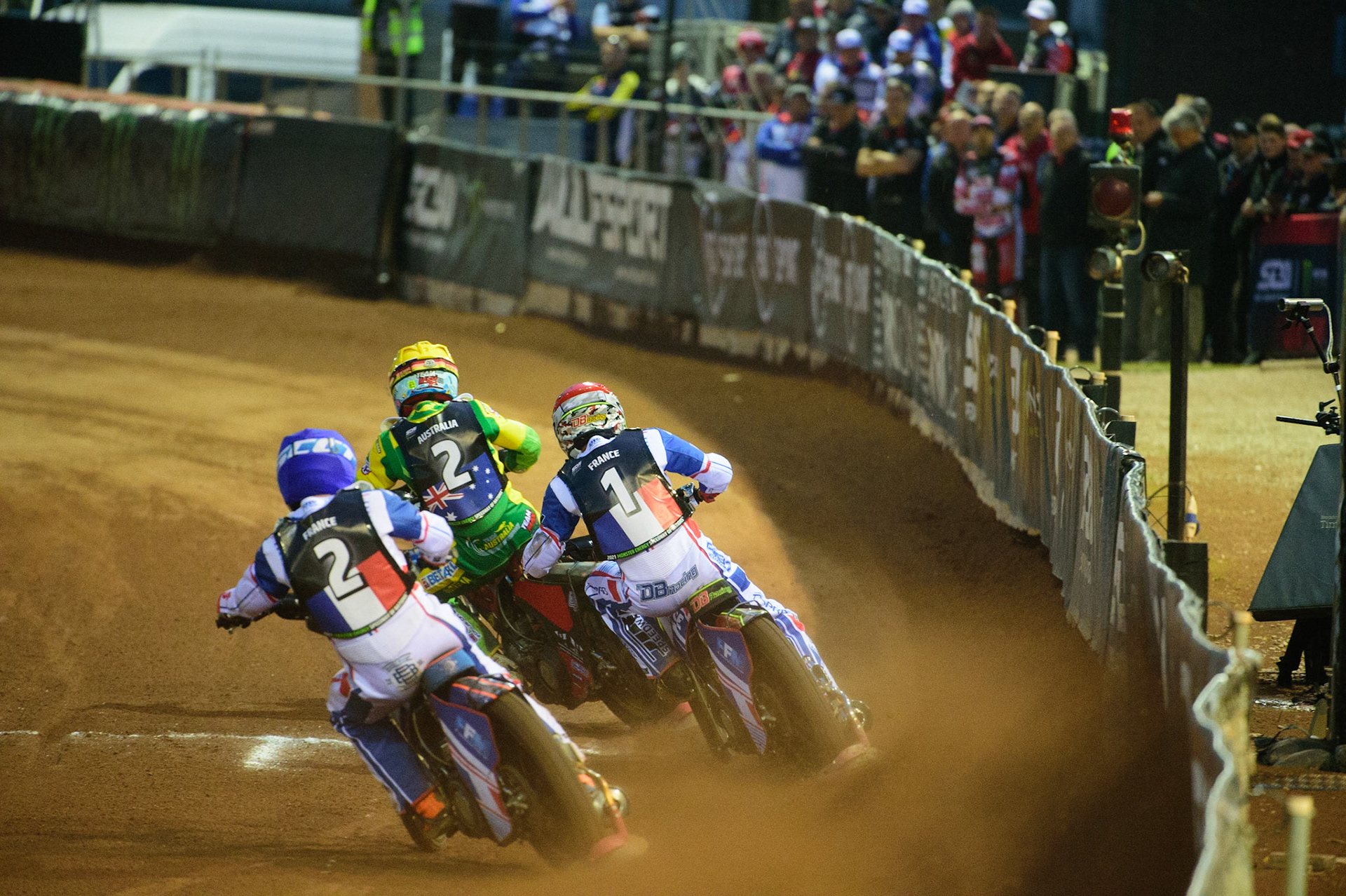 MANCHESTER, UK. OCT 16TH Dmitri Berge of France (Blue) and David Bellego of France (Red) chases Max Fricke of Australia (Yellow) during the Monster Energy FIM Speedway of Nations at the National Speedway Stadium, Manchester on Saturday  16th October 2021. (Credit: Ian Charles | MI News)