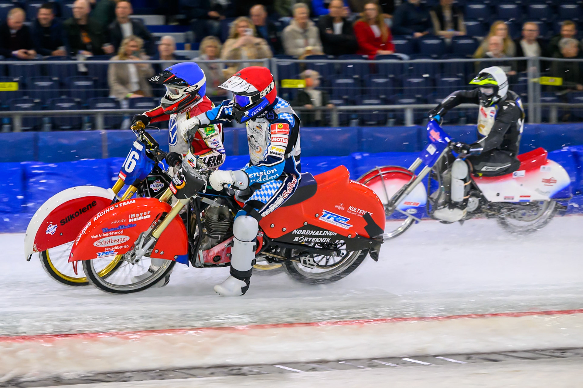 Simon Mayer of Germany  in Red rides inside'Josef Kreuzberger of Austria in Blue with Aron Schokker of The Netherlands  in White behind during the ROELOF THIJS BOKAAL at Ice Rink Thialf, Heerenveen on Friday 10th April 2026.  (Photo: Ian Charles | MI News)