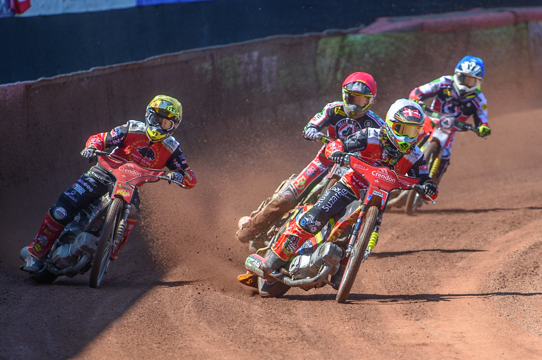 MANCHESTER, UK. MAY 31ST  Michael Palm Toft  (White) and Scott Nicholls  (Yellow) lead Charles Wright  (Red) and Tom Brennan  (Blue) during the SGB Premiership match between Belle Vue Aces and Peterborough at the National Speedway Stadium, Manchester on Monday 31st May 2021. (Credit: Ian Charles | MI News)