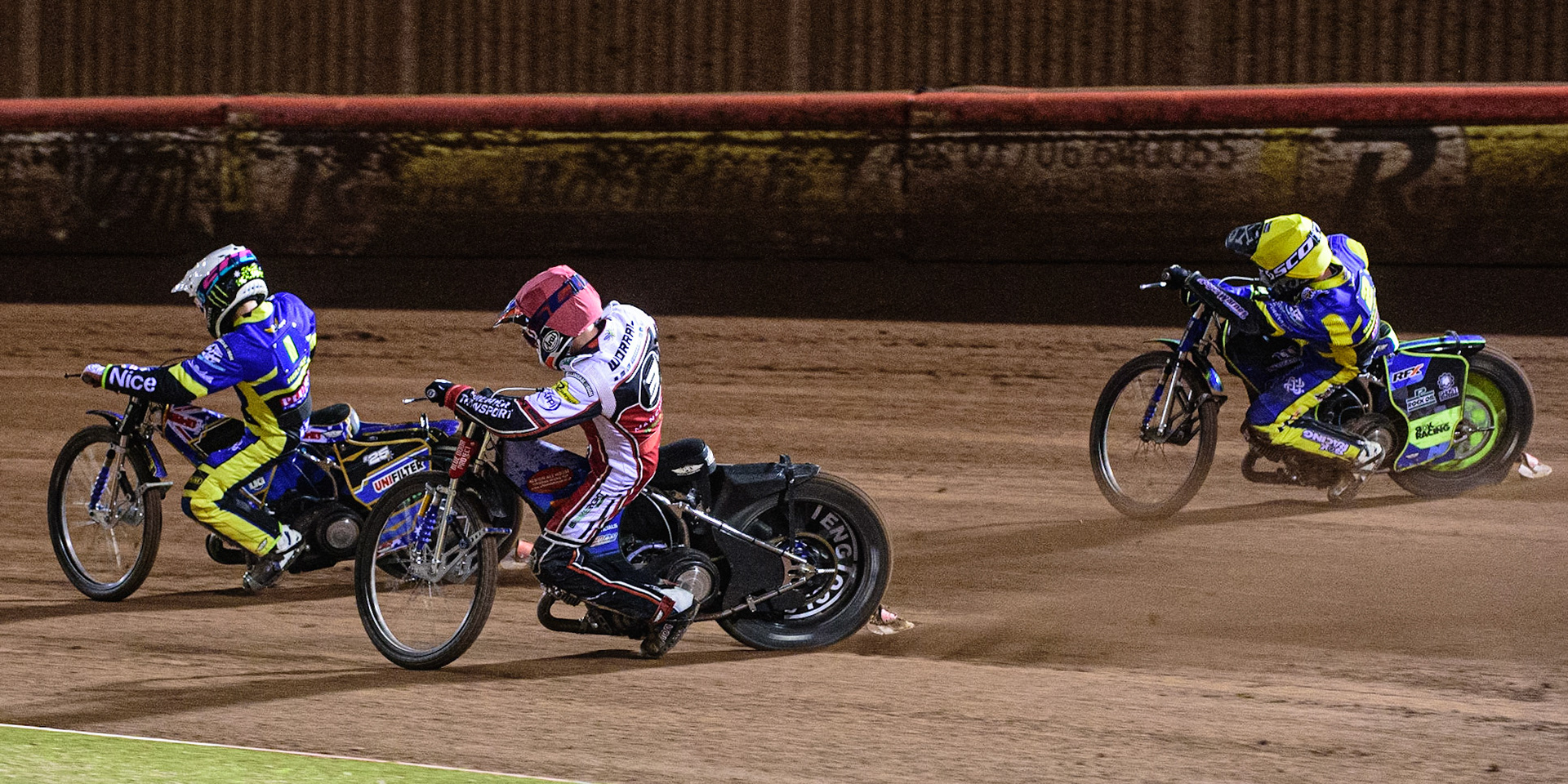MANCHESTER, UK. OCT 7TH  Steve Worrall   (Red) chases Jack Holder  (White) with Troy Batchelor  (Yellow) on the outside  during the SGB Premiership Play off Semi-Final Second Leg between Belle Vue Aces and Sheffield Tigers at the National Speedway Stadium, Manchester on Thursday 7th October 2021. (Credit: Ian Charles | MI News)
