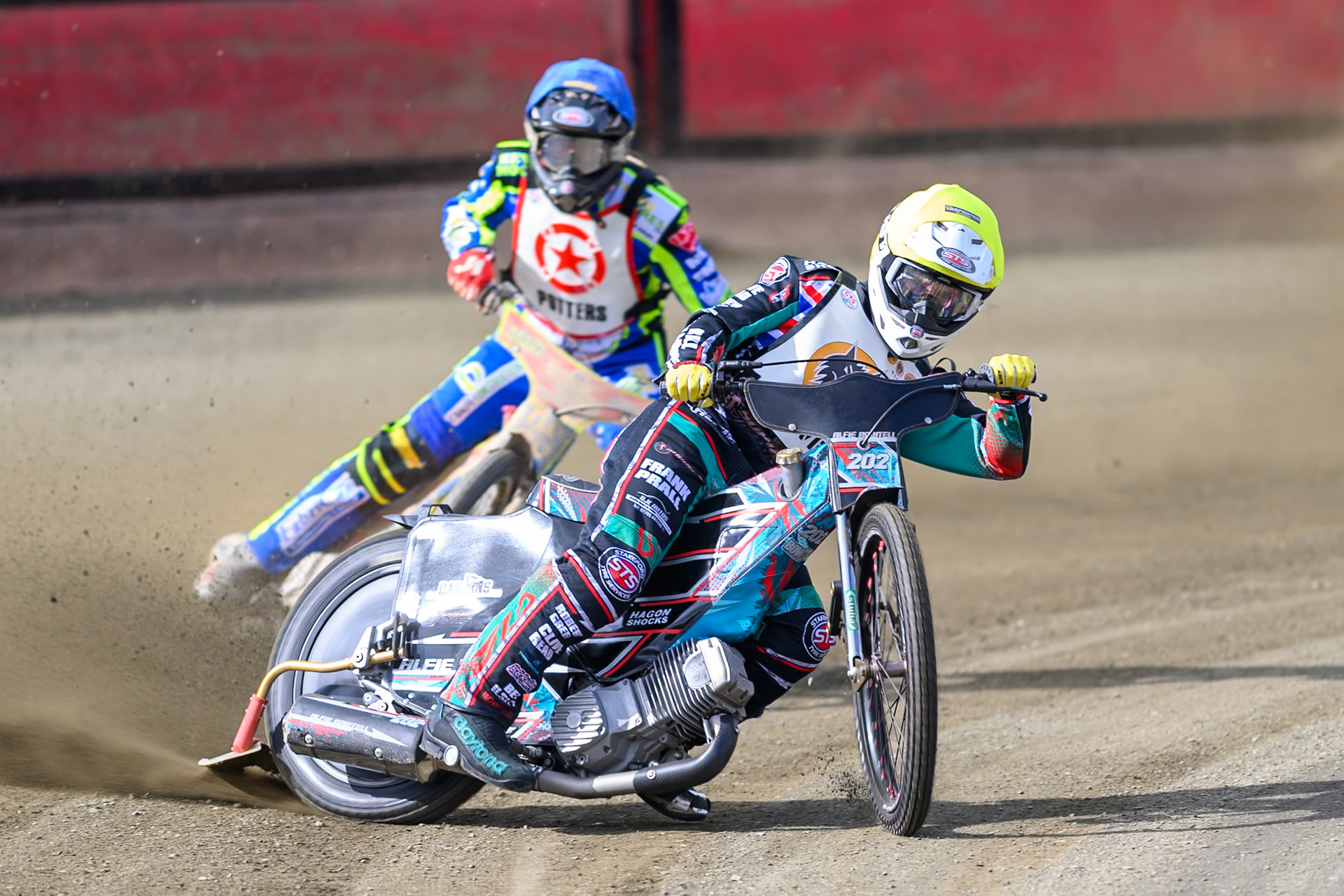 Alfie Bowtell of 'The Wolves'  in Yellow leading Simon Lambert of 'The Potters'  in Blue during the Regina Chains Fours at Buxton Speedway, Buxton on Sunday 5th April 2026. (Photo: Ian Charles | MI News)