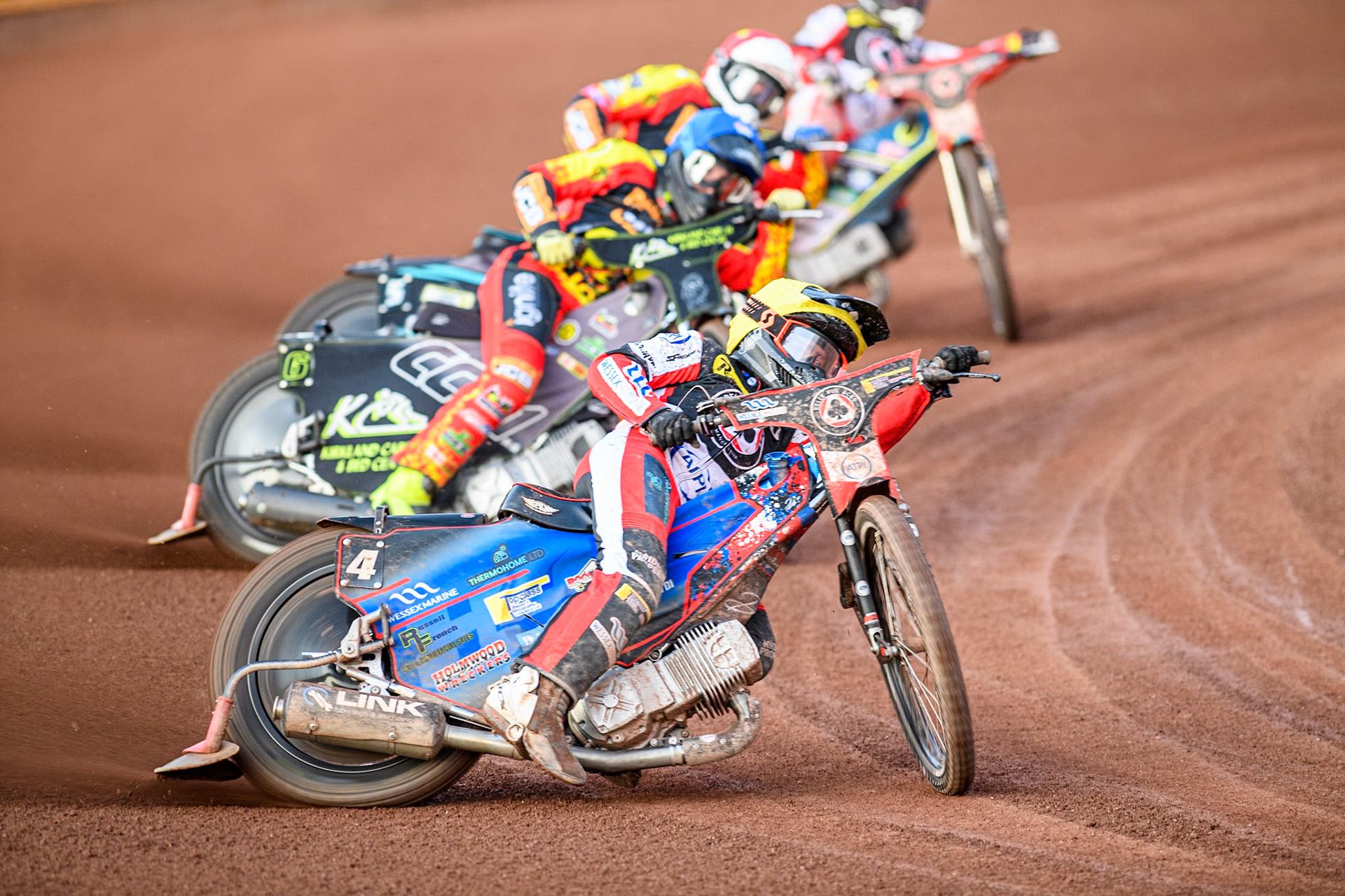 Belle Vue Aces' Ben Cook in Yellow leading Leicester Lions' Craig Cook in Blue, Leicester Lions' Ryan Douglas in Red and Belle Vue Aces' Jaimon Lidsey in Red during the Rowe Motor Oil Premiership match between Leicester Lions and Belle Vue Aces at the Pidcock Motorcycles Arena, Leicester on Thursday 25th July 2024. (Photo: Ian Charles | MI News)