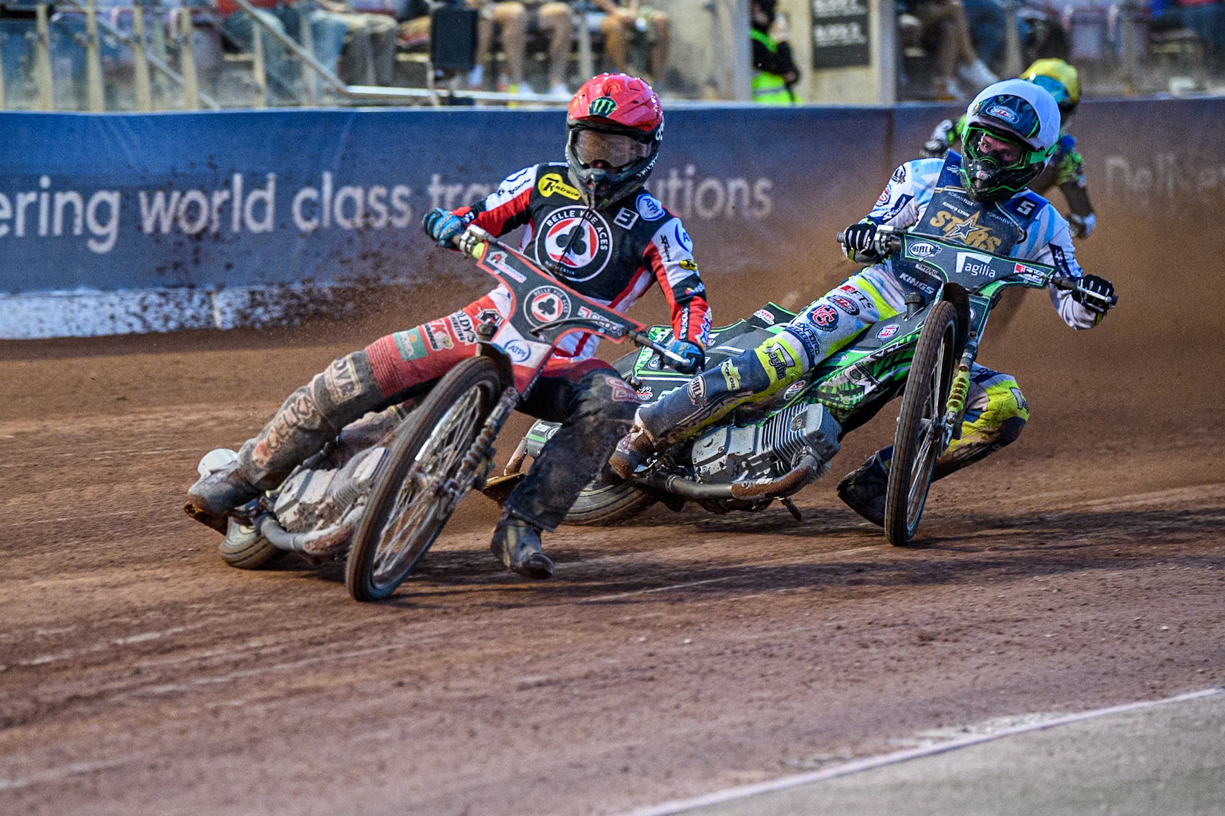 Belle Vue Aces' Jaimon Lidsey  in Red leading Kings Lynn Stars' Guest Rider Charles Wright  in White during the Rowe Motor Oil Premiership match between Belle Vue Aces and King's Lynn Stars at the National Speedway Stadium, Manchester on Monday 12th August 2024. (Photo: Ian Charles | MI News)