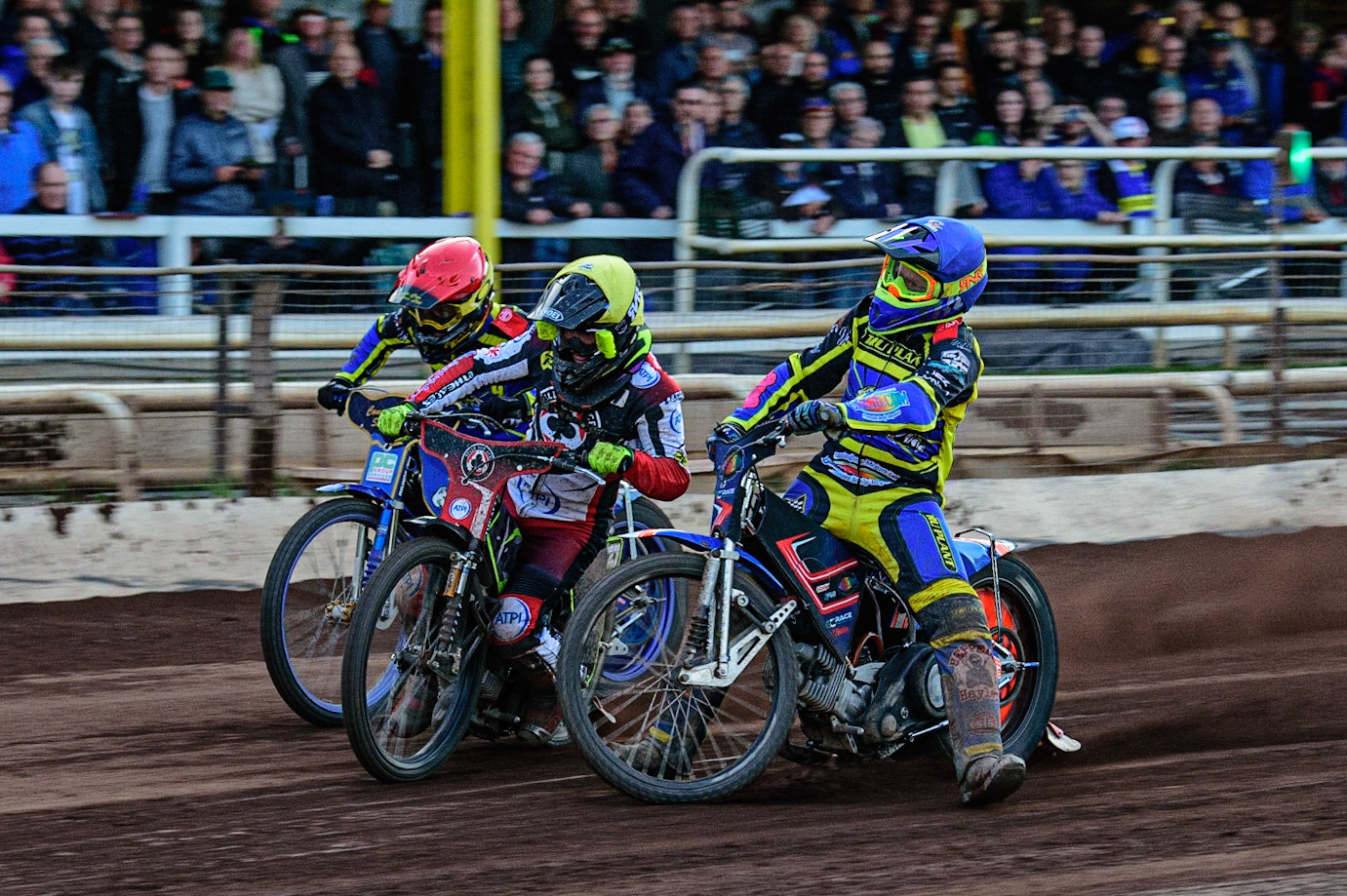 SHEFFIELD, UK. MAY 26TH  Stefan Nielsen  loses control and collides with Tom Brennan  (Yellow) with Kyle Howarth  (Red) on the outside during the SGB Premiership match between Sheffield Tigers and Belle Vue Aces at Owlerton Stadium, Sheffield on Thursday 26th May 2022. (Credit: Ian Charles | MI News)