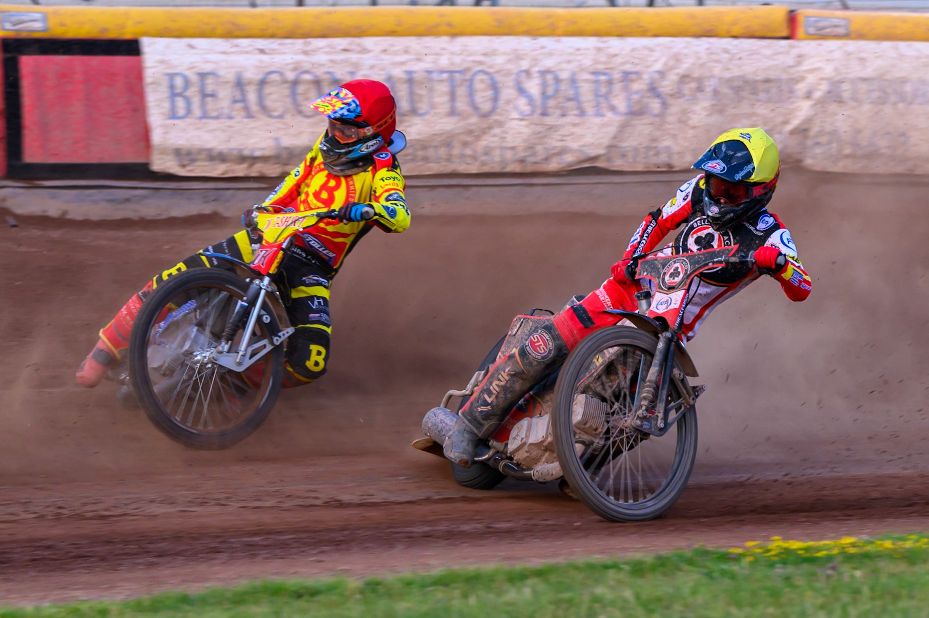 Belle Vue Aces' Zach Cook in Yellow on the inside  Birmingham Brummies' Jonas Jeppesen in Red during the Rowe Motor Oil Premiership match between Birmingham Brummies and Belle Vue Aces at Perry Bar Stadium, Birmingham on Monday 2nd June 2025. (Photo: Ian Charles | MI News)