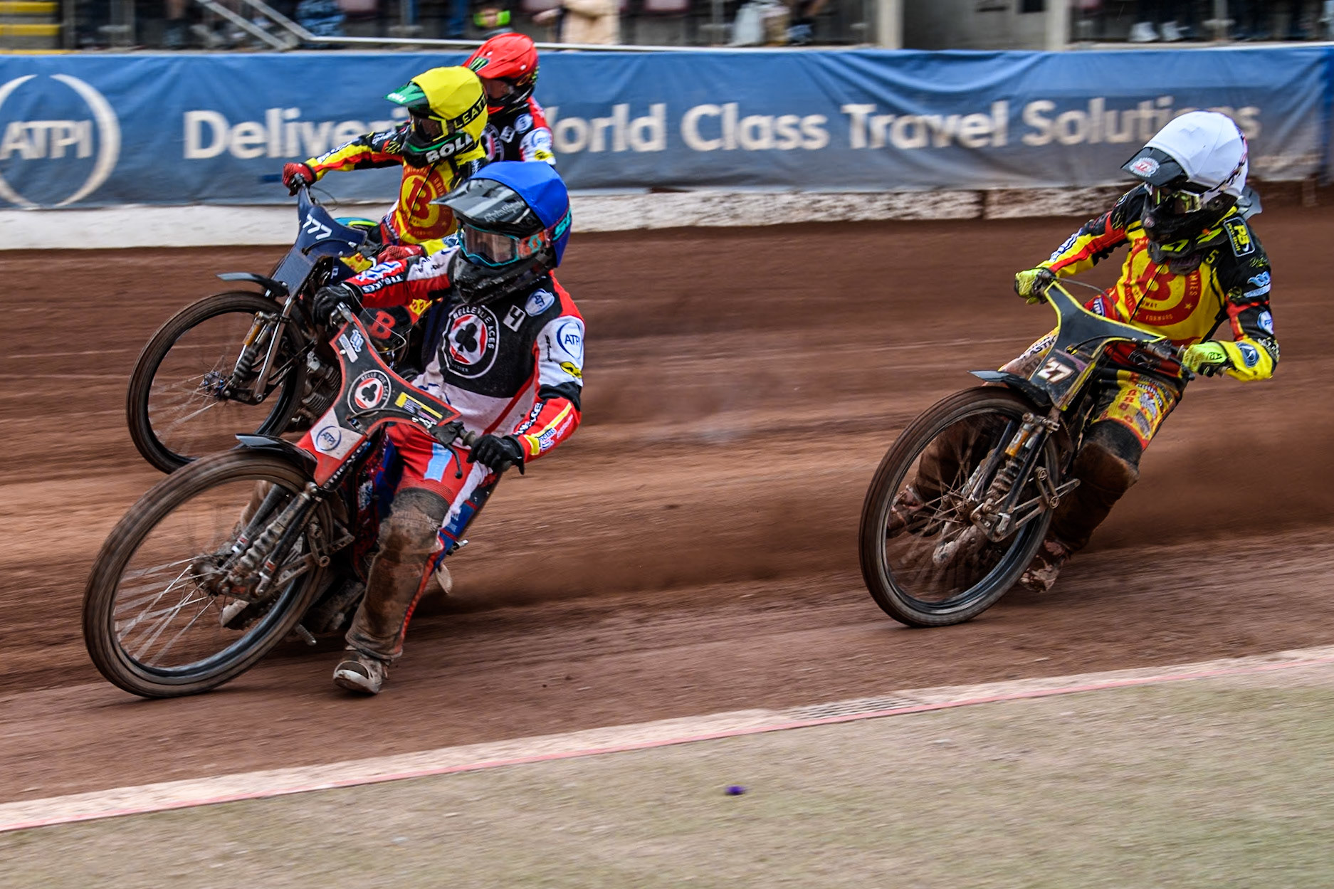 Belle Vue Aces' Ben Cook  in Blue leading Birmingham Brummies' Tom Brennan  in White, Birmingham Brummies' Piotr Pawlicki  in Yellow and Belle Vue Aces' Jaimon Lidsey  in Red during the Rowe Motor Oil Premiership match between Belle Vue Aces and Birmingham Brummies at the National Speedway Stadium, Manchester on Monday 6th May 2024. (Photo: Ian Charles | MI News)