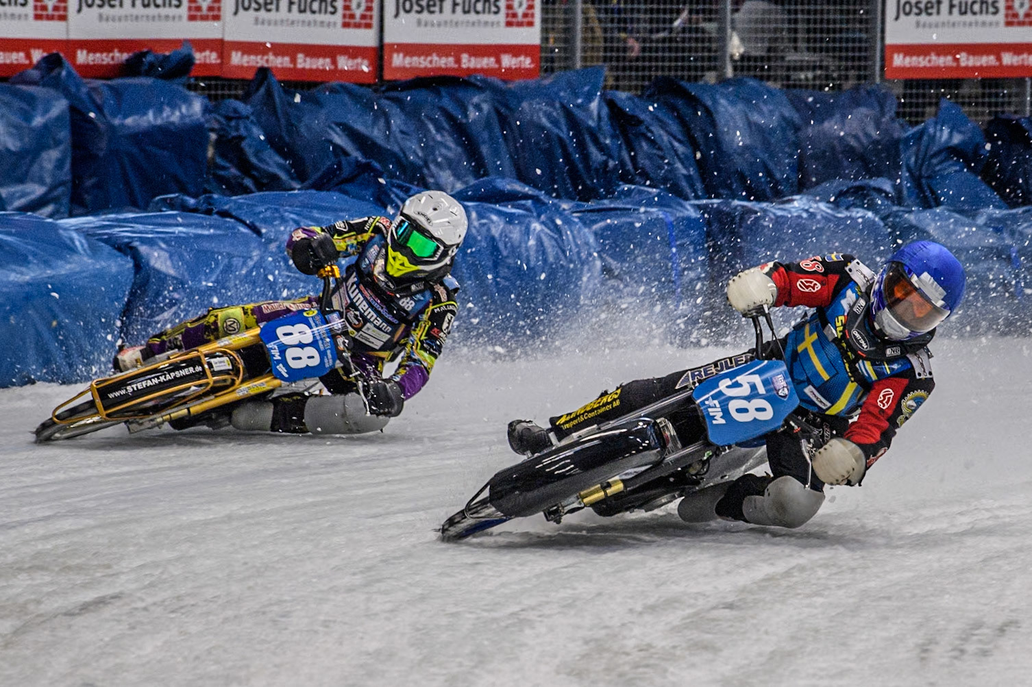 Sweden's Stefan Svensson (58) (Blue) leads  Germany's Max Niedermaier (88) (White) during the FIM Ice Speedway Gladiators World Championship Final 2 at the Max-Aicher-Arena, Inzell on Sunday 24 March 2024. (Photo: Ian Charles | MI News)