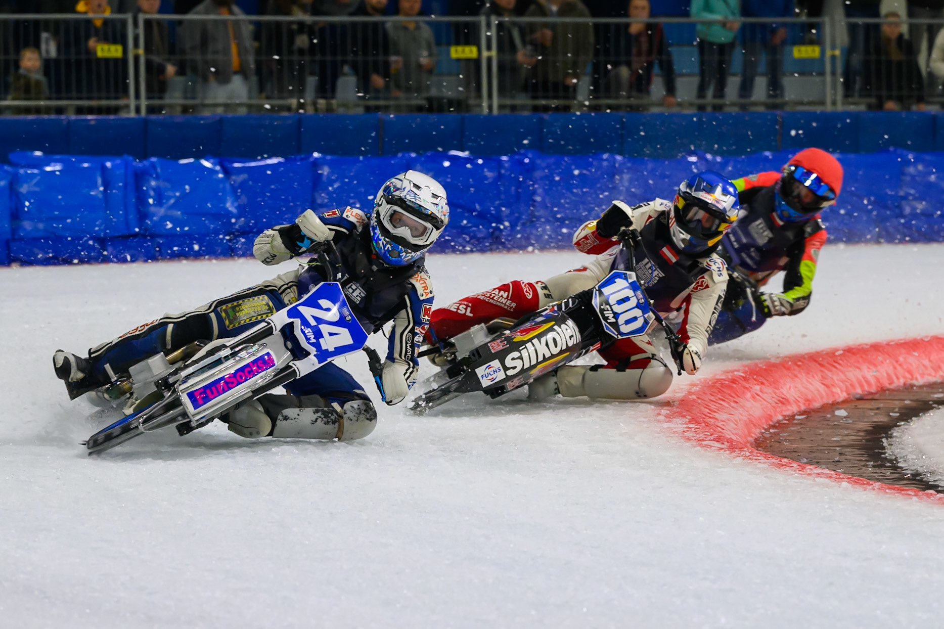 Max Koivula (24) of Finland in White leading Franz Zorn (100) of Austria in Blue and Wild Card Harald Simon (16) of Austria  in Red during the FIM Ice Speedway Gladiators World Championship Final 3 at Ice Rink Thialf, Heerenveen on Saturday 11th April 2026. (Photo: Ian Charles | MI News)