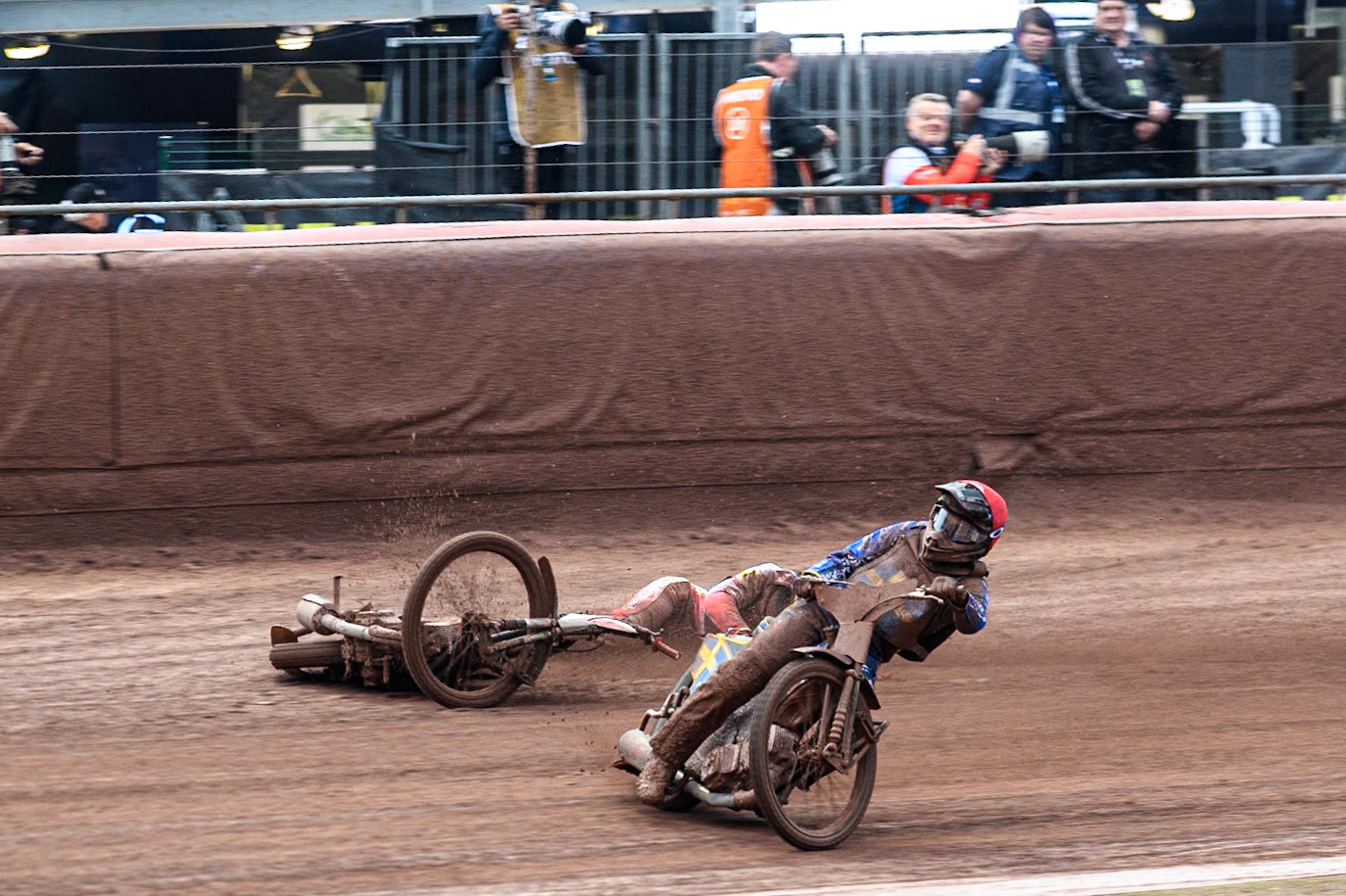Bartosz Banbor of Poland falls behind Philip Hellström-Bängs of Sweden in Red during the Monster Energy FIM Speedway of Nations 2 (Under 21) Final at the National Speedway Stadium, Manchester on Friday 12th July 2024. (Photo: Ian Charles | MI News)