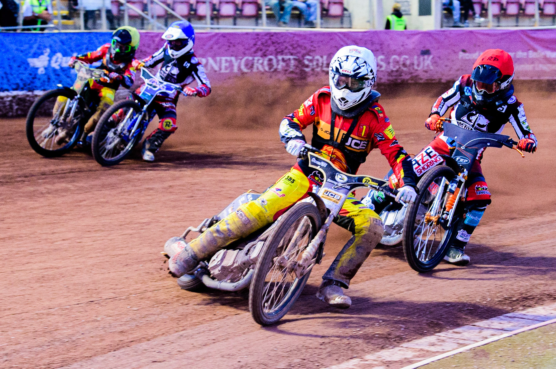 Dan Thompson  (White) leads Jack Smith  (Red) with Archie Freeman  (Blue) and Max Perry   (Yellow) behind during the National Development League match between Belle Vue Aces and Leicester Lions at the National Speedway Stadium, Manchester on Friday 19th August 2022. (Credit: Ian Charles | MI News)