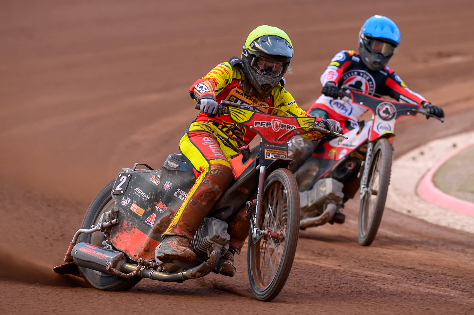 Dan Thompson of Leicester Lions in Yellow leading Tate Zischke of Belle Vue Aces in Blue during the Rowe Motor Oil Premiership match between Belle Vue Aces and Leicester Lions at the National Speedway Stadium, Manchester on Monday 15th June 2026. (Photo: Ian Charles | MI News)