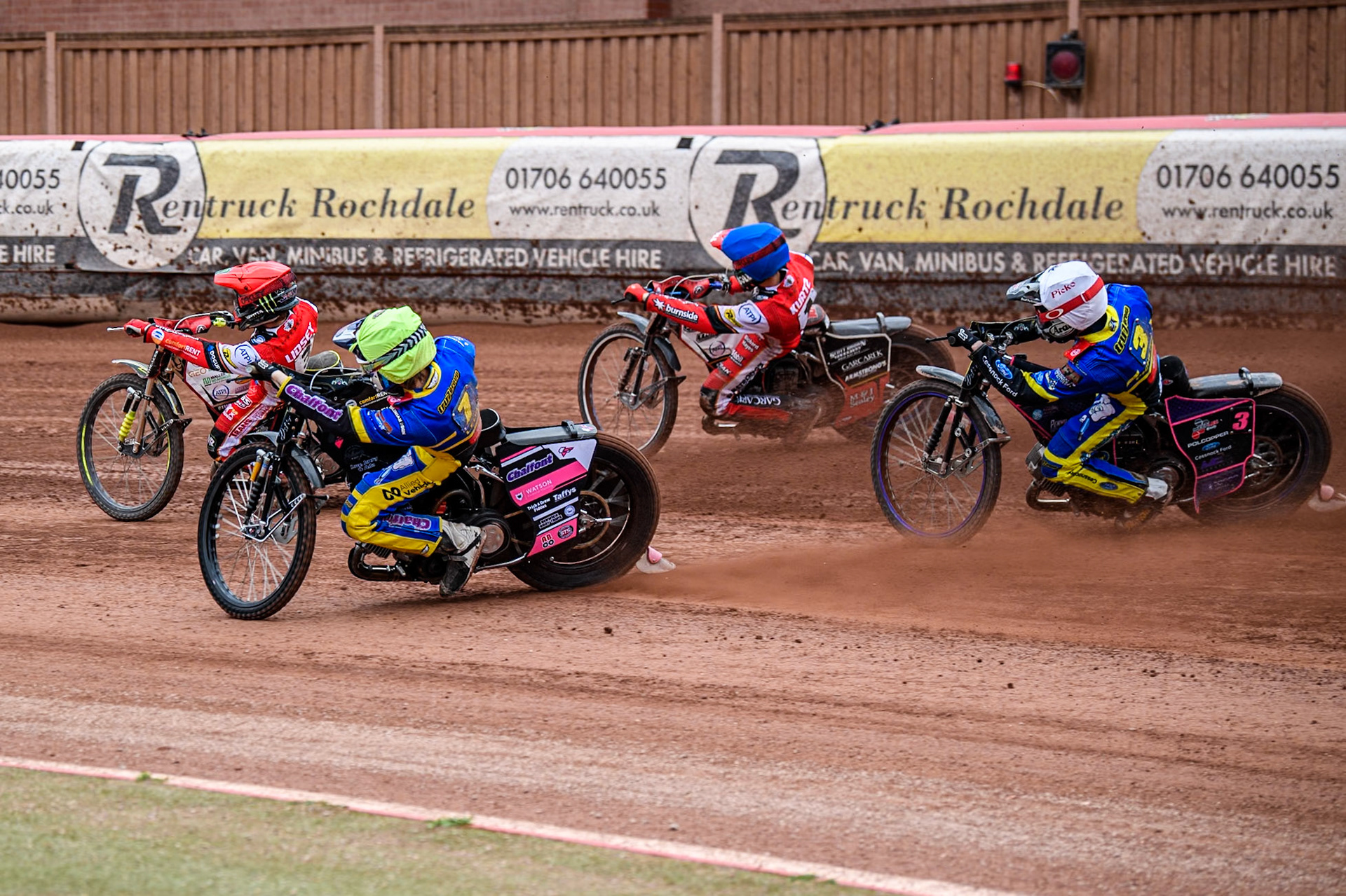 Jaimon Lidsey of Belle Vue Aces in Red leading Brady Kurtz of Belle Vue Aces in Blue Leon Flint of Sheffield Tigers in Yellow and Chris Holder of Sheffield Tigers in White during the Rowe Motor Oil Premiership match between Belle Vue Aces and Sheffield Tigers at the National Speedway Stadium, Manchester on Monday 5th May 2025. (Photo: Ian Charles | MI News)