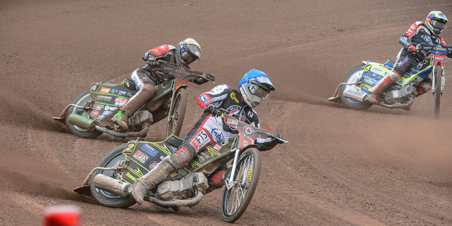 MANCHESTER, UK. MAY 2ND  Jye Etheridge   (Blue) leads Benjamin Basso  (Yellow) and Chris Harris  (White) during the SGB Premiership match between Belle Vue Aces and Peterborough at the National Speedway Stadium, Manchester on Monday 2nd May 2022. (Credit: Ian Charles | MI News)