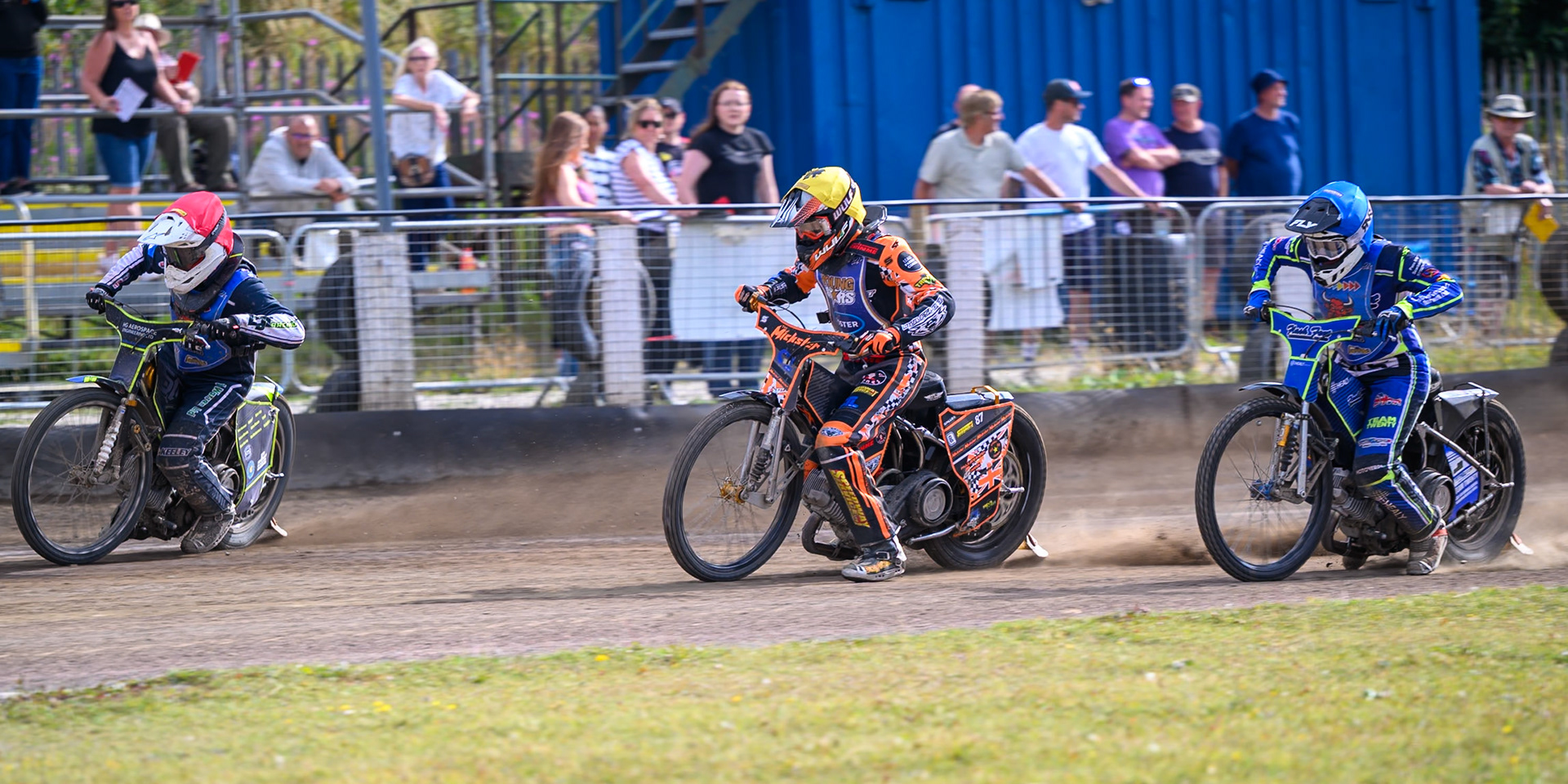 (L to R) Nathan Ablitt, Guest Rider for Buxton Bulls in Red  Mickie Simpson of Kings Lynn Young Stars and Arran Butcher of Buxton Bulls leave the start in Heat 10 during the WSRA National Development League match between Buxton Bulls and King's Lynn Young Stars at Hi-Edge Speedway, Buxton on Sunday 9th August 2026. (Photo: Ian Charles | MI News)