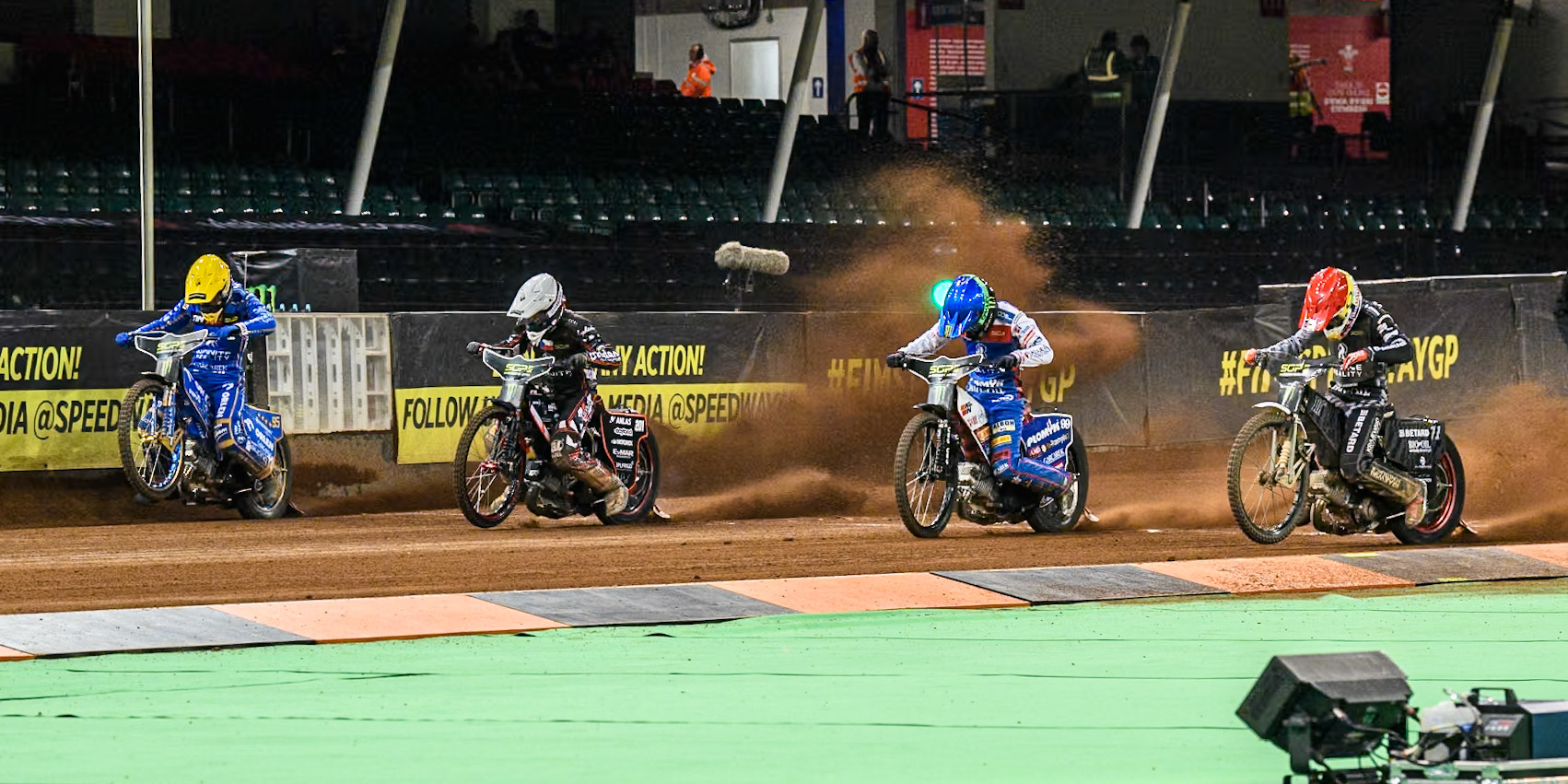 (L to R) Bartosz Zmarzlik (95) of Poland  in Yellow, January Kvech (201) of Czechia in White, Daniel Bewley (99) of Great Britain in Blue and Maciej Janowski (71) of Poland in Red during the FIM Speedway Grand Prix of Great Britain at The Principality Stadium, Cardiff on Saturday 17th August 2024. (Photo: Ian Charles | MI News)