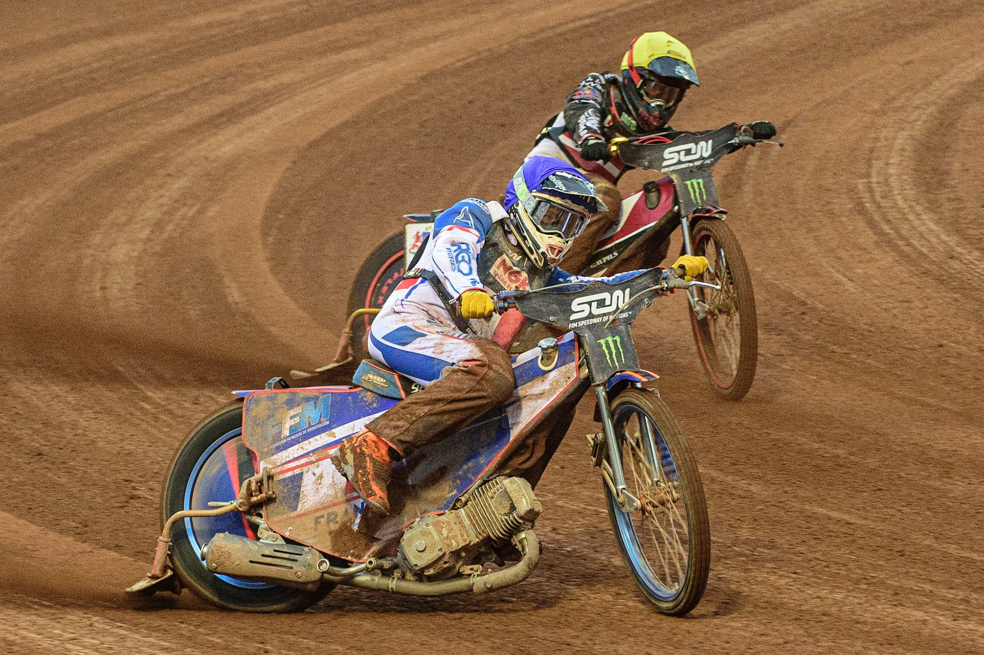 MANCHESTER, UK. OCT 17TH Dmitri Berge of France (Blue) outside Olegs Mijailovs of Latvia (Yellow) during the Monster Energy FIM Speedway of Nations at the National Speedway Stadium, Manchester on Sunday  17th October 2021. (Credit: Ian Charles | MI News)