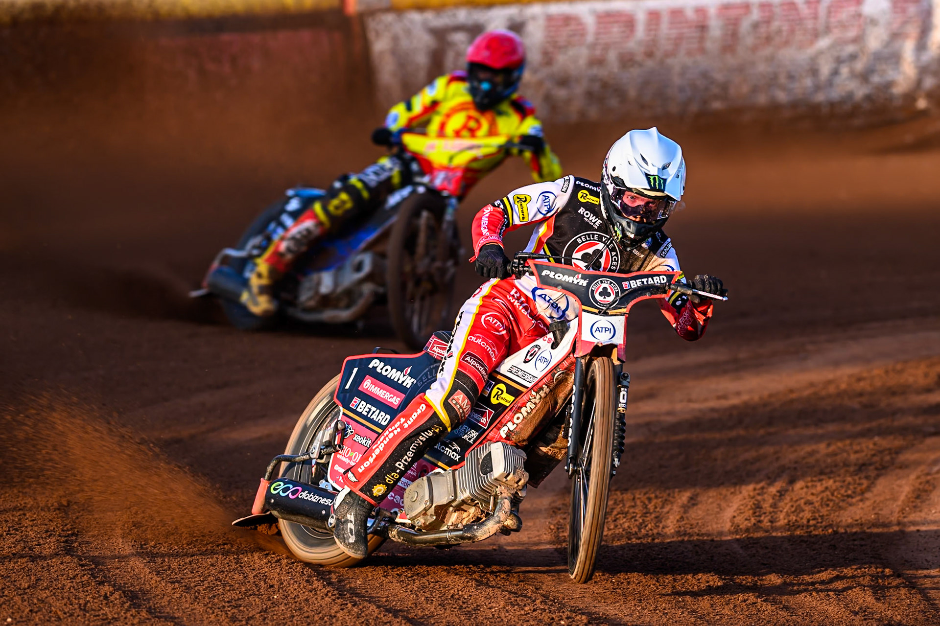 Belle Vue Aces' Dan Bewley in White leading Birmingham Brummies' Matej Zagar in Red during the Rowe Motor Oil Premiership match between Birmingham Brummies and Belle Vue Aces at Perry Bar Stadium, Birmingham on Monday 2nd June 2025. (Photo: Ian Charles | MI News)