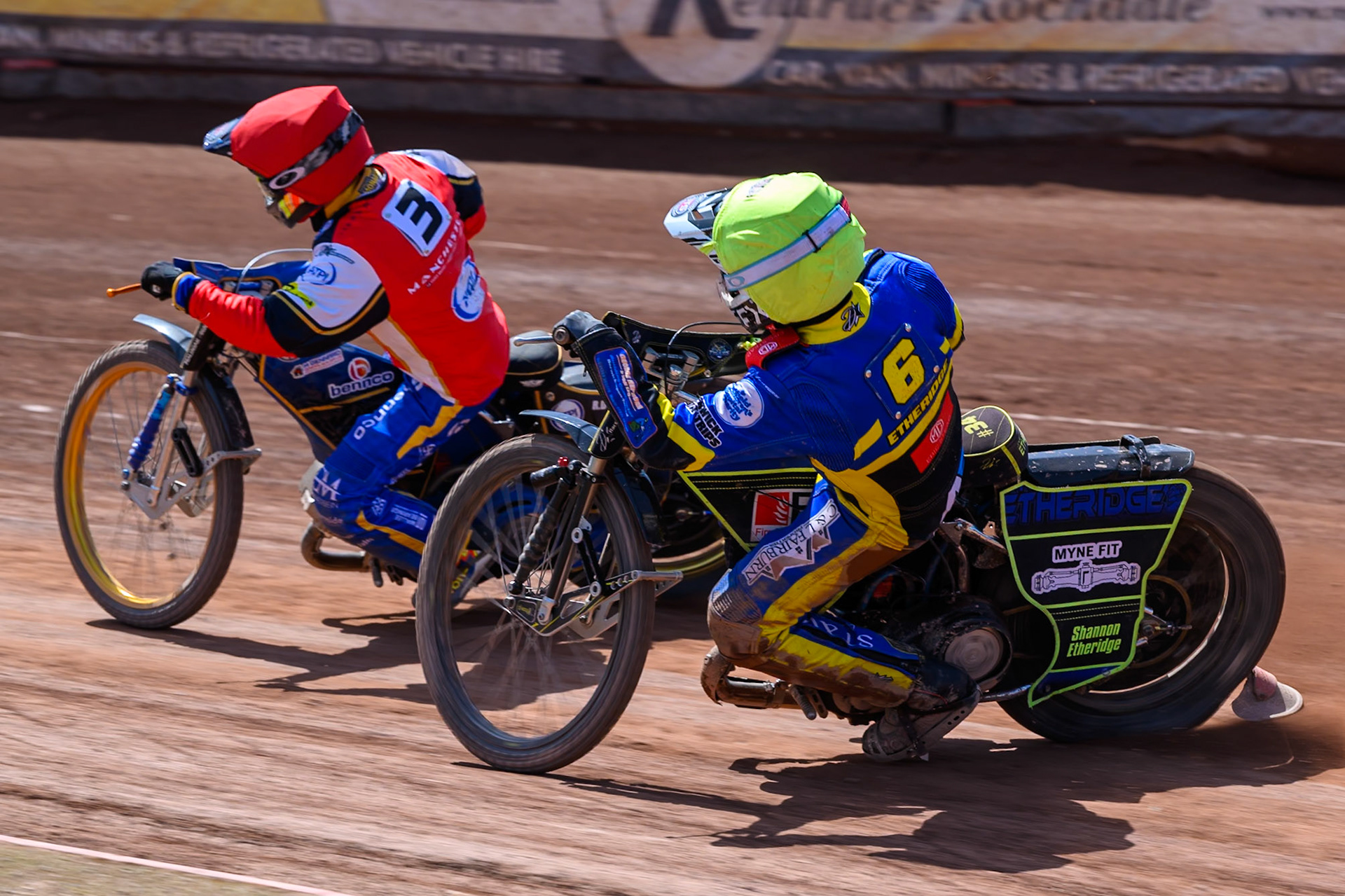 Jye Etheridge of Sheffield Tigers in Yellow chases Justin Sedgman, Guest Rider for Belle Vue Aces in Red during the Rowe Motor Oil Premiership match between Belle Vue Aces and Sheffield Tigers at the National Speedway Stadium, Manchester on Monday 25th May 2026. (Photo: Ian Charles | MI News)