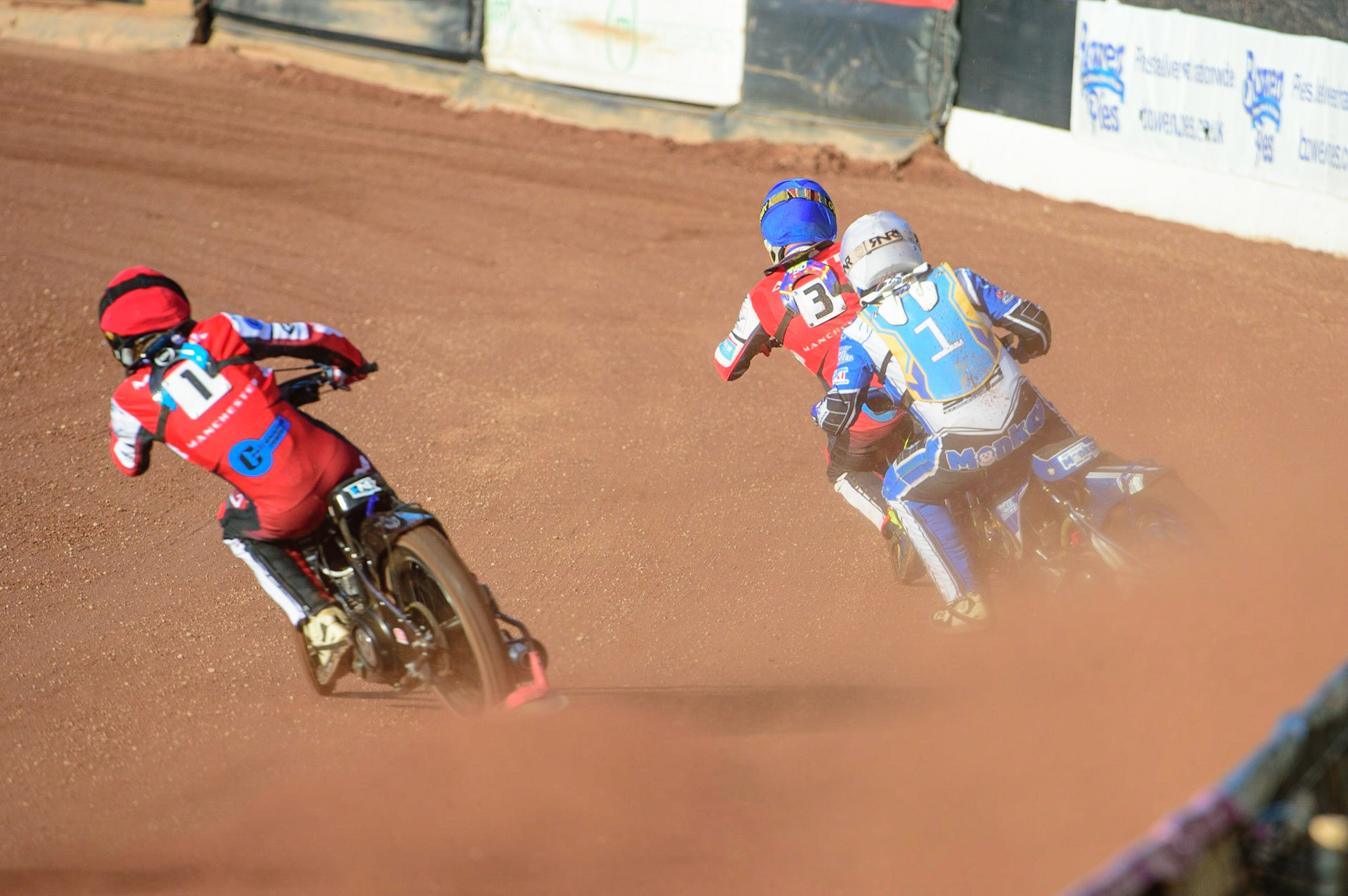 MANCHESTER, UK. MAY 27TH  Harry McGurk  (Red) passes Danny Phillips   (White) with Nathan Ablitt  leading during the National Development League match between Belle Vue Colts and Armadale Devils at the National Speedway Stadium, Manchester on Friday 27th May 2022. (Credit: Ian Charles | MI News)