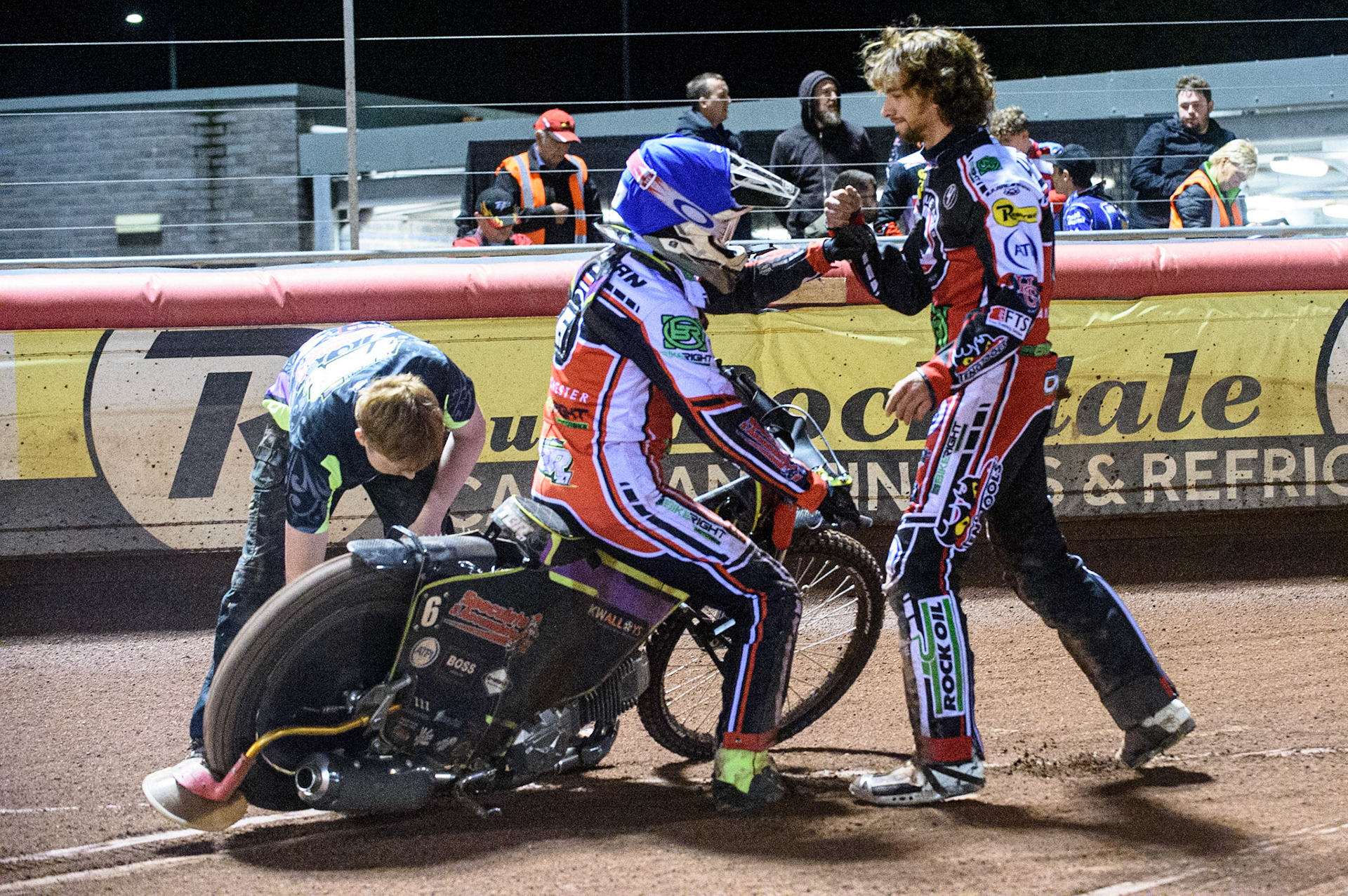 MANCHESTER, UK. SEPT 13TH  Tom Brennan  is congratulated by team mate Charles Wright  (right) after his heat during the SGB Premiership match between Belle Vue Aces and King's Lynn Stars at the National Speedway Stadium, Manchester on Monday 13th September 2021. (Credit: Ian Charles | MI News)